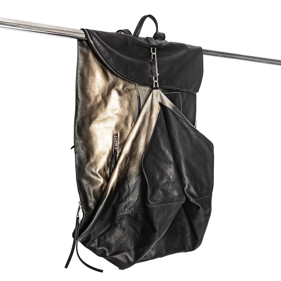 Rick Owens Larry Degrade Metallic Gradient and Black Leather Mega Duffle

From Spring 2019 Larry LeGaspi inspired collection
Limited Edition﻿
Metallic gradient over a soft black with overdye
Silver-tone hardware
Asymmetrical upper
Detachable handle