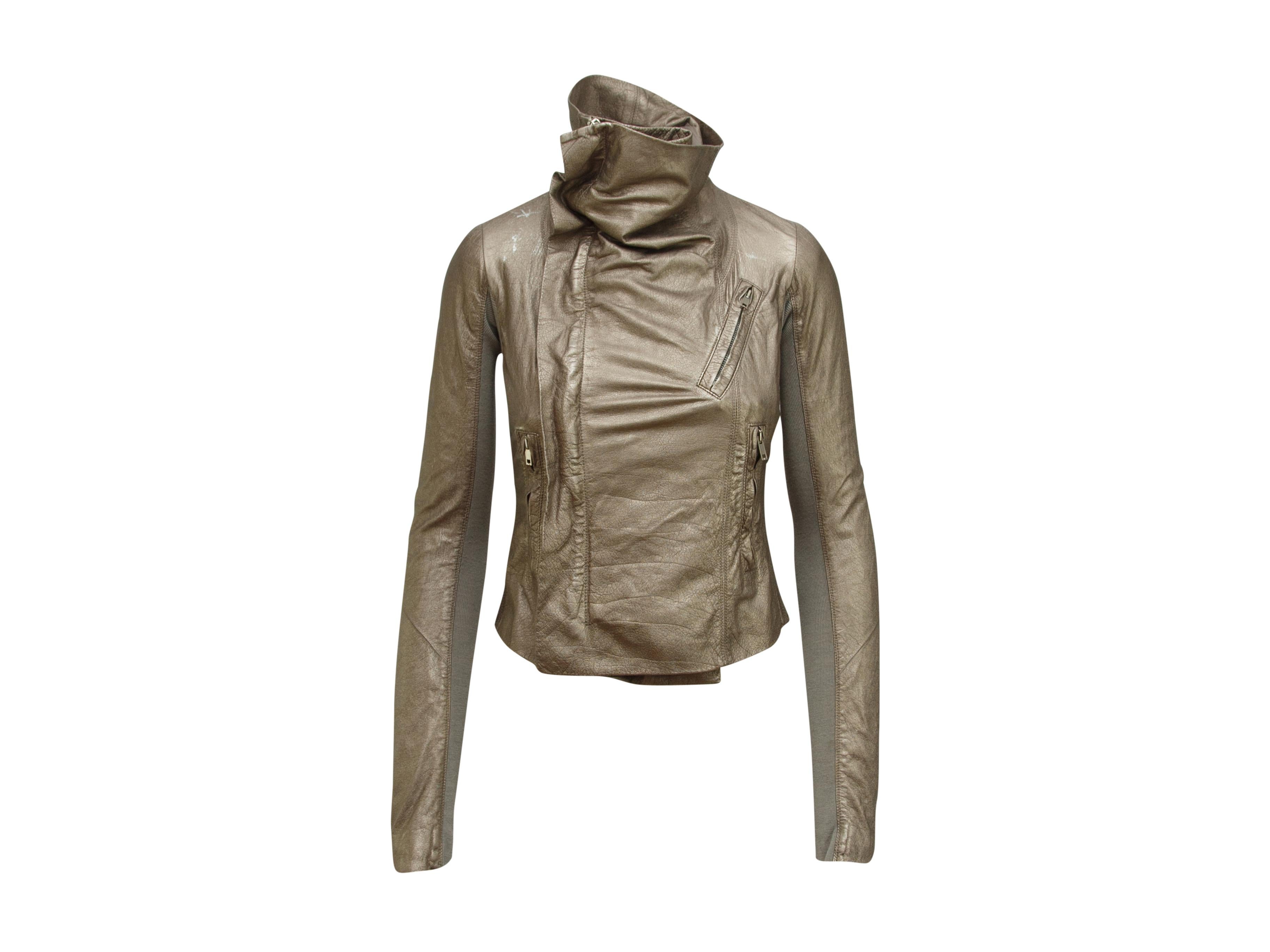 Product details:  Metallic gold leather jacket by Rick Owens.  Draped collar.  Long sleeves with stretch panels.  Asymmetrical zip-front closure.  Chest and waist zip pockets.  32