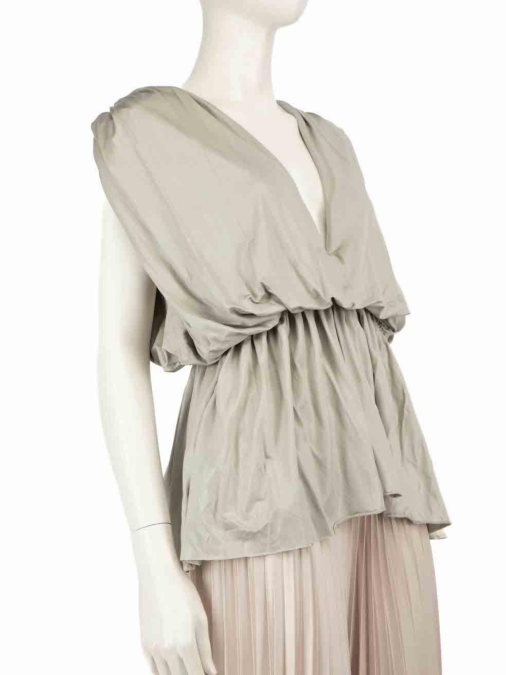 CONDITION is Very good. Hardly any visible wear to the top is evident on this used Rick Owens designer resale item.
 
 Details
 Grey
 Viscose
 Top
 Elasticated waist
 Sleeveless
 V-neck
 
 
 Made in Italy
 
 Composition
 95% Viscose, 5% Elastane
 
