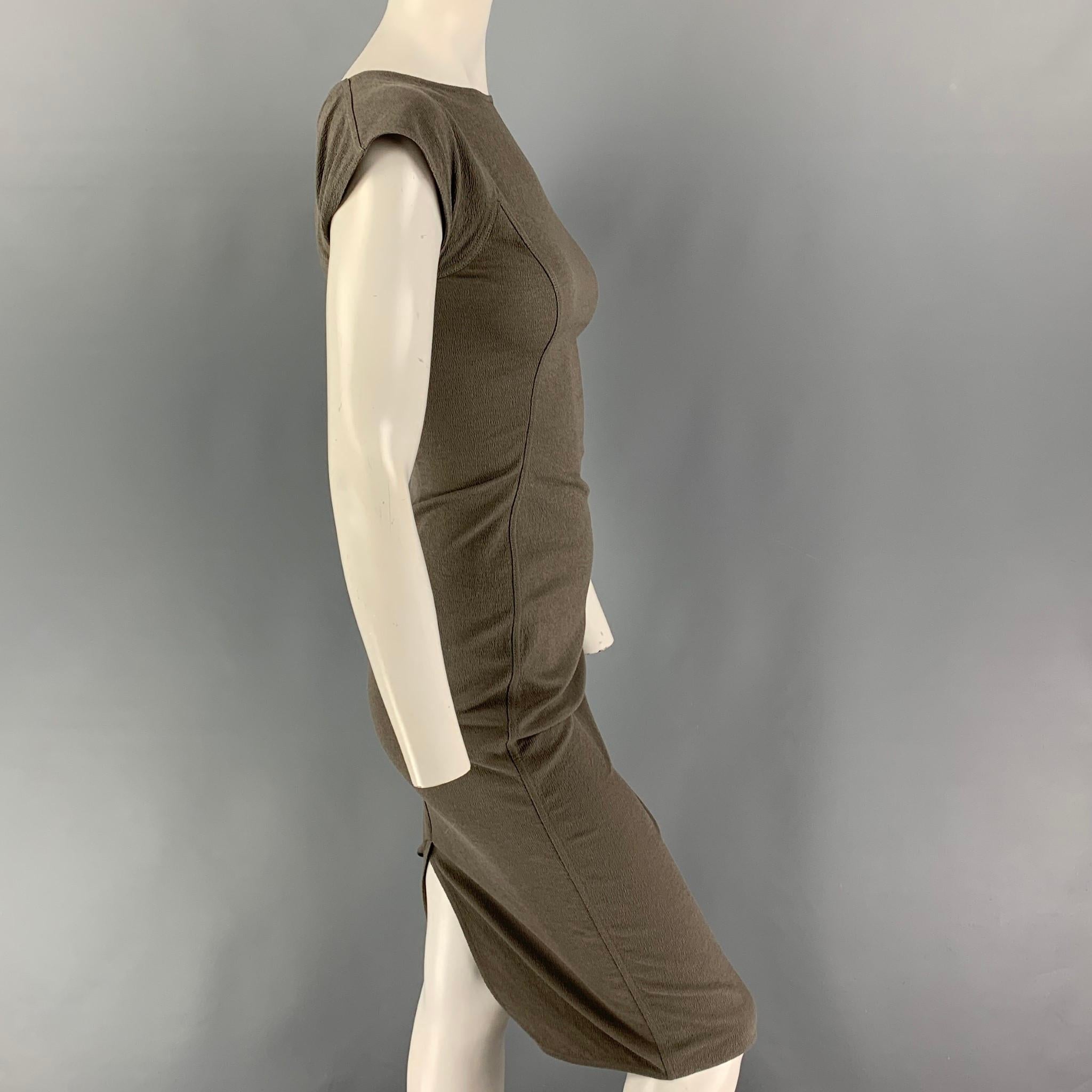 RICK OWENS GETHSEMANE FW 21 fitted dress comes in a moss textured cotton blend featuring cap sleeves, round neck, and a back zipper closure. Made in Italy. 

Very Good Pre-Owned Condition.
Marked: IT 38 / GB 6 / DE 34 / US