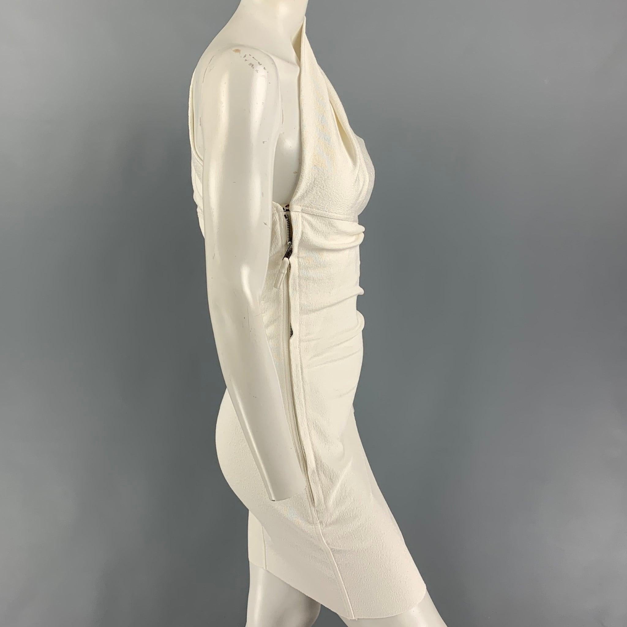 RICK OWENS STROBE FW 22 'Diana' dress comes in a off white crepe cotton blend featuring a over the shoulder draped sculptural silhouette, single sleeve, and a concealed hook & zip closure.
Very Good
Pre-Owned Condition. 

Marked:  IT 38 / GB 6 / DE