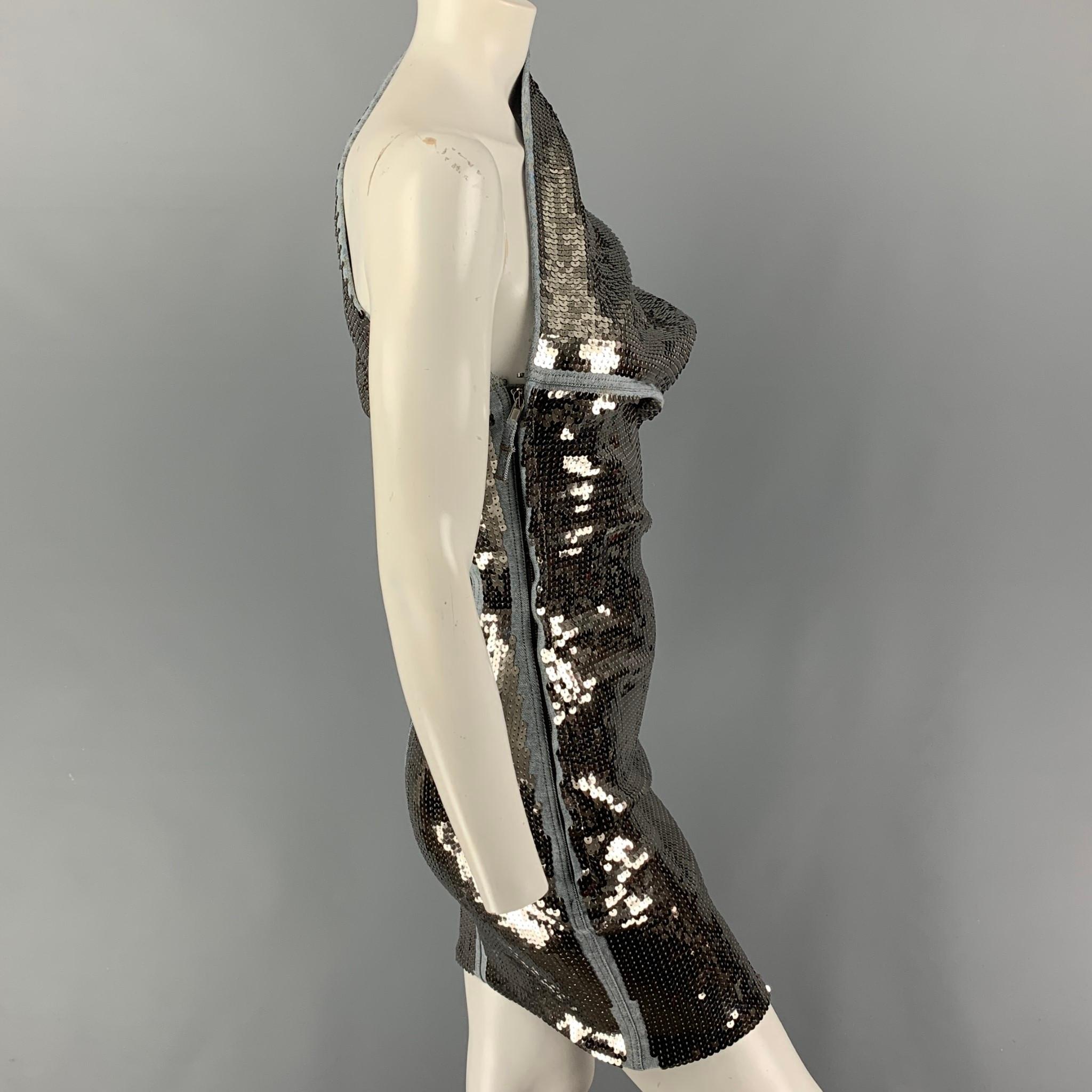 RICK OWENS STROBE FW 22 'Diana' dress comes in a silver sequined cotton blend with a blue denim trim featuring a over the shoulder draped sculptural silhouette, single sleeve, and a concealed hook & zip closure. 

Very Good Pre-Owned