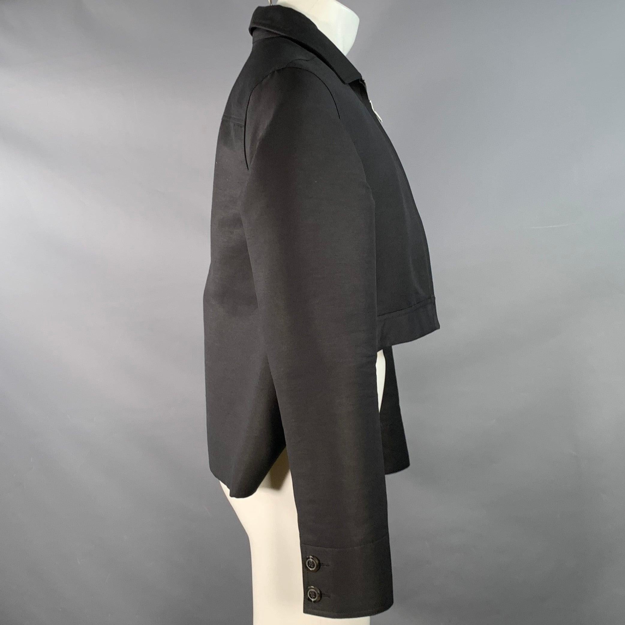 RICK OWENS jacket
in a black cotton blend fabric featuring a blouson style with cropped front hem, double button cuffs, and zip up closure. Made in Italy.Very Good Pre-Owned Condition. Minor mark. 

Marked:   IT 48 

Measurements: 
 
Shoulder: 16.5