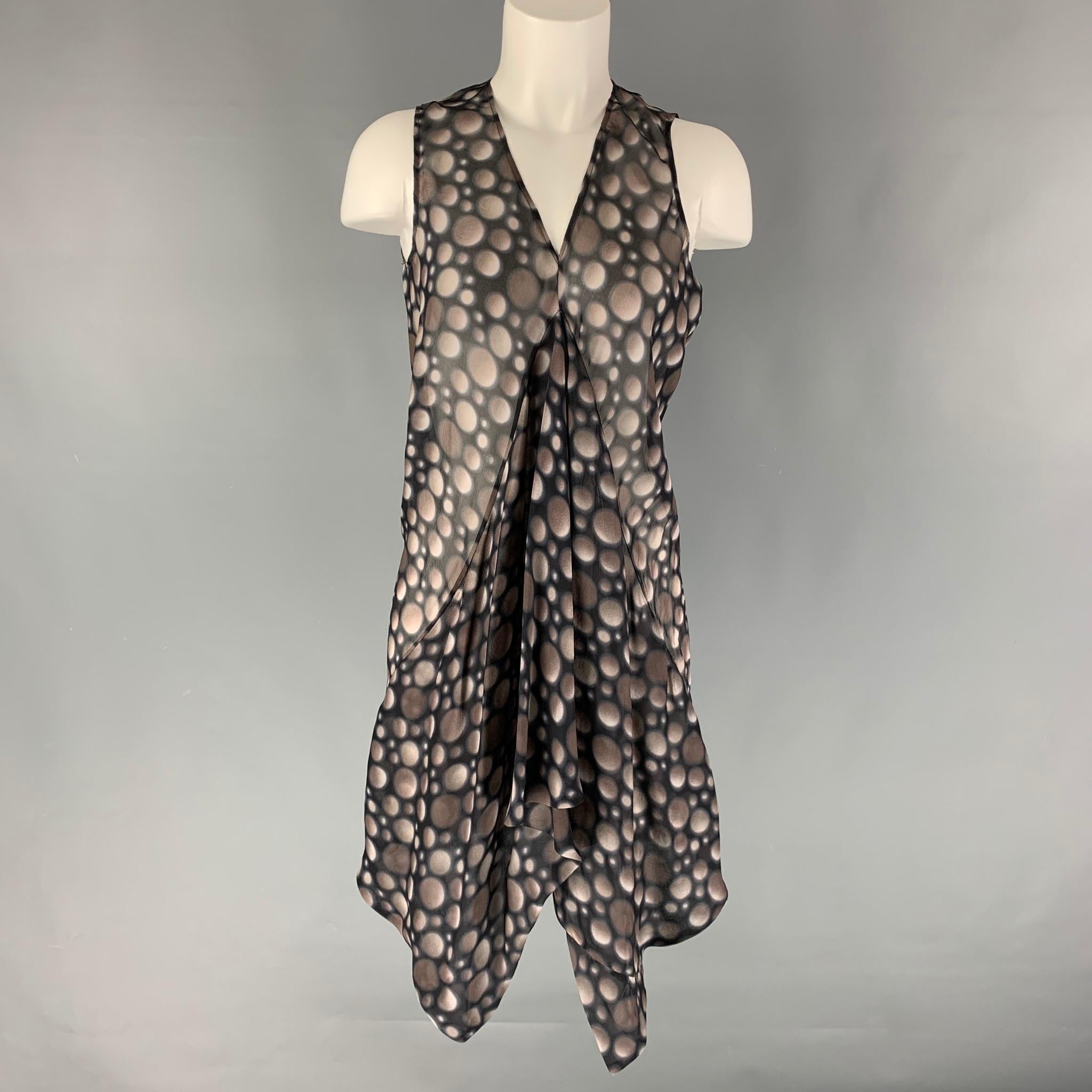 RICK OWENS sleeveless dress comes in a black and taupe dots fluid fabric featuring see through style, asymmetrical hem and v-neck.

Excellent Pre-Owned Condition. Fabric and Size tags removed.
Marked: no size marked

Measurements:

Shoulder: 11.5