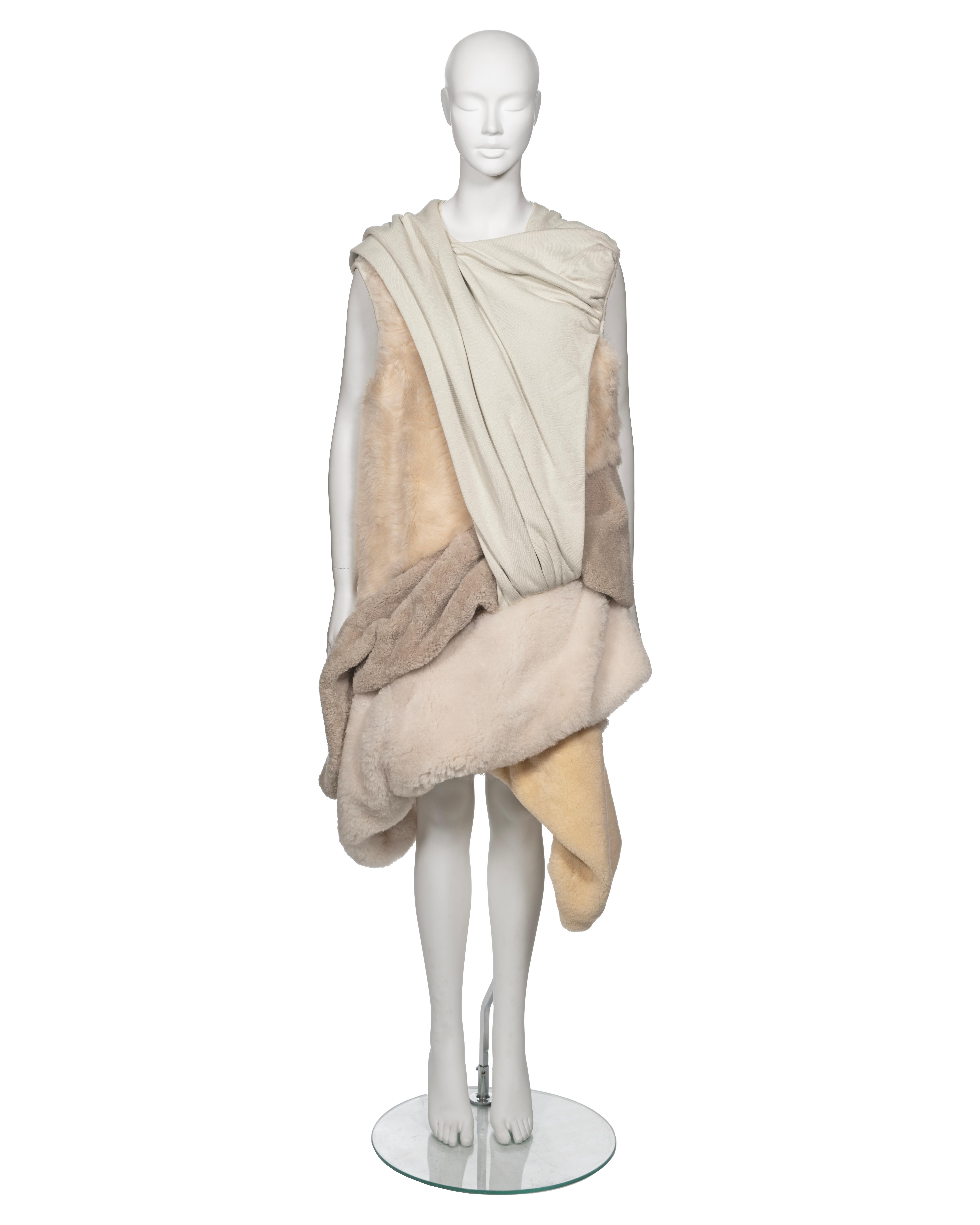 ▪ Archival Rick Owens 'Mastodon' Dress
▪ Fall-Winter 2016
▪ Sold by One of a Kind Archive
▪ Crafted from intricately intertwined layers of draped shearling, sheepskin, and thick cotton jersey
▪ Boasts an oversized fit
▪ Robust heavyweight