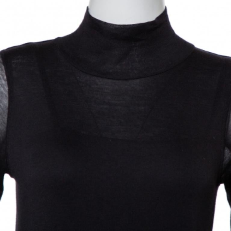 This black mini dress is from the Rick Owens Lilies Collection. Knit using quality materials, the dress has a turtleneck design, long sleeves, and a sheer effect.