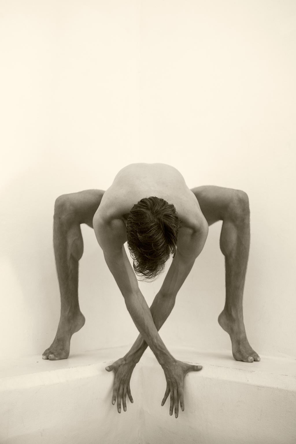 Ricky Cohete Nude Photograph - Folding man. Two. Motion Series. Male Sepia Photograph