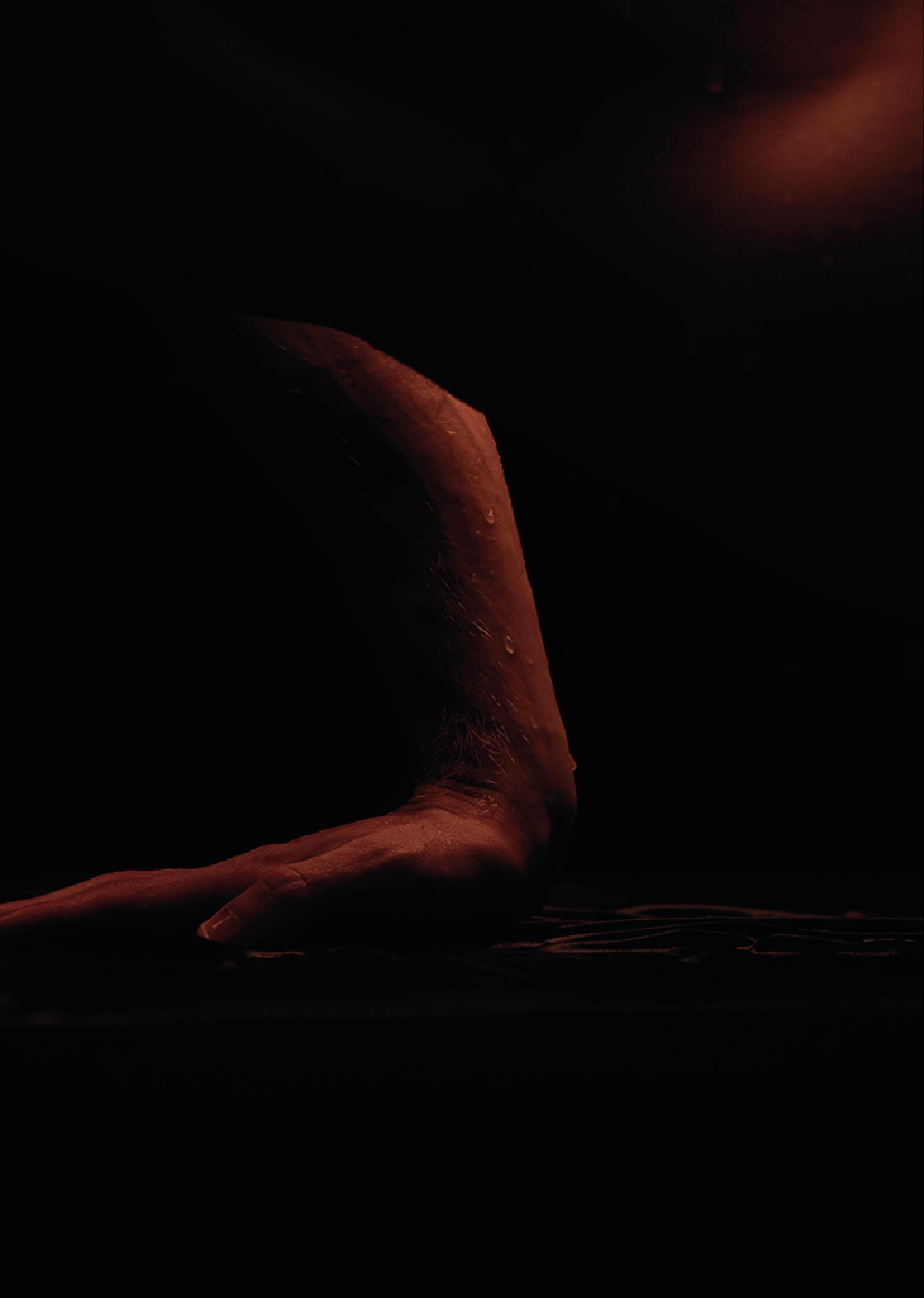 Latidos. Momentum, series. Male Nude Limited Edition Color Photograph - Black Nude Photograph by Ricky Cohete