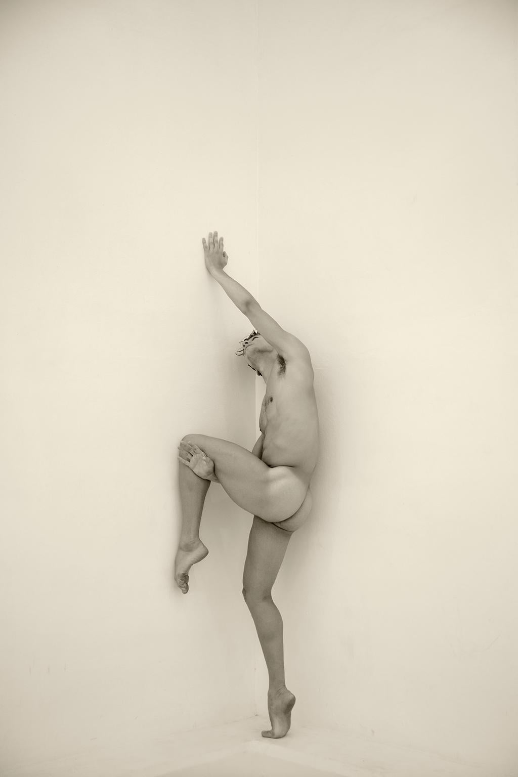 Ricky Cohete Black and White Photograph - Man against wall, Two. Motion Series. Male Nude Sepia Photograph