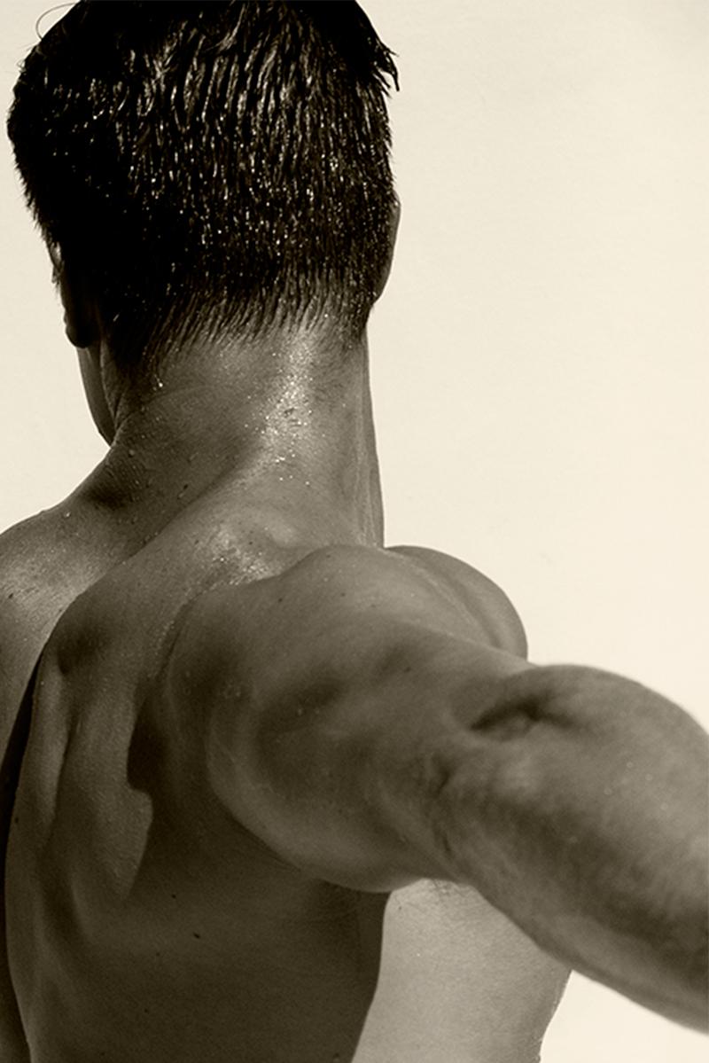Man Back, One. Motion Series. Male Sepia Photograph - Beige Nude Photograph by Ricky Cohete