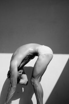 Man Curve, Four. Motion Series. Male Nude Black and White Photograph