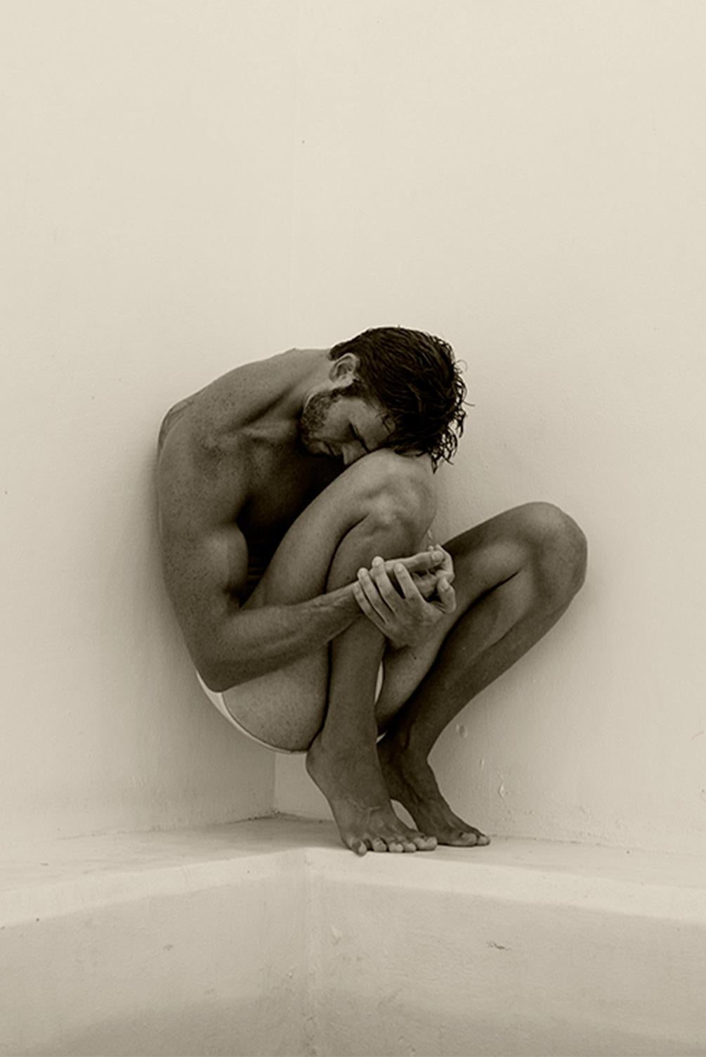 Man Curve, One. Motion Series. Male Sepia Photograph - Beige Nude Photograph by Ricky Cohete