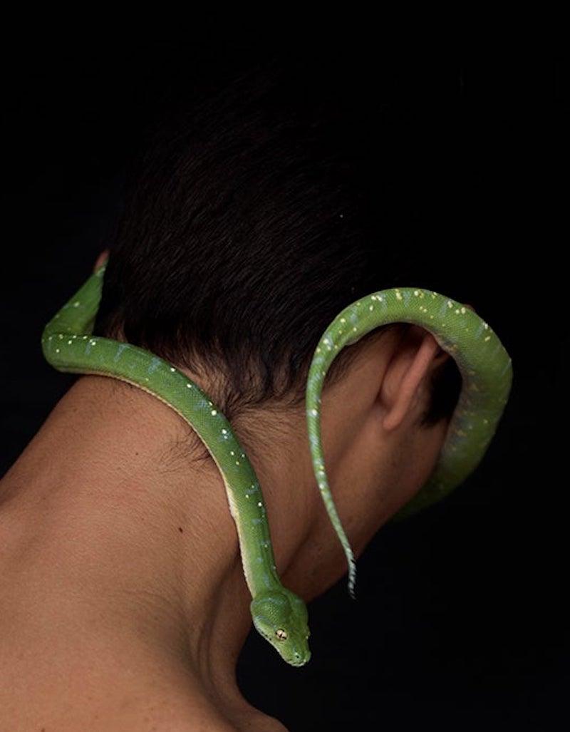 Man & Serpent Two. Limited Edition Color Photograph - Black Portrait Photograph by Ricky Cohete