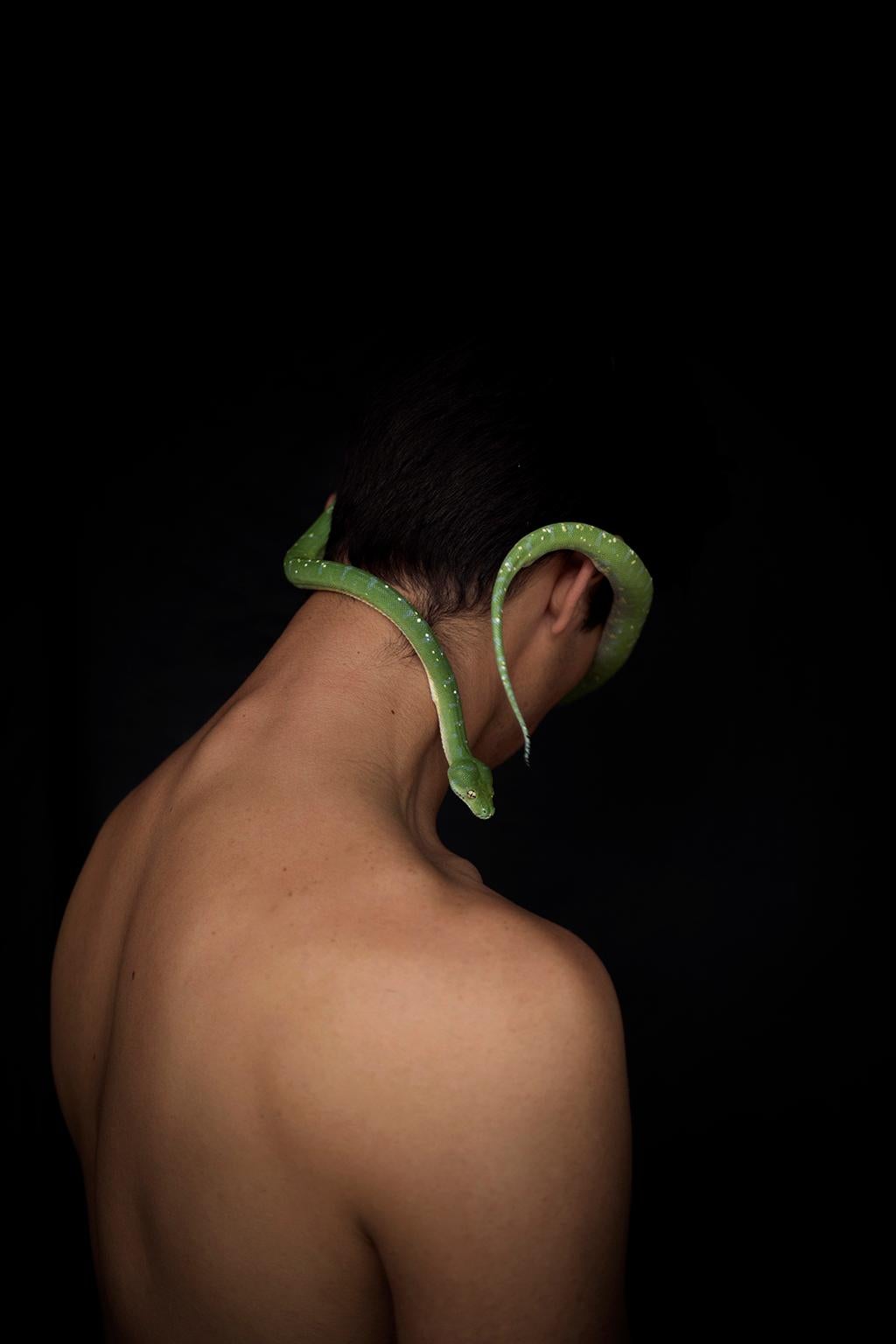 Ricky Cohete Portrait Photograph - Man & Serpent Two. Limited Edition Color Photograph