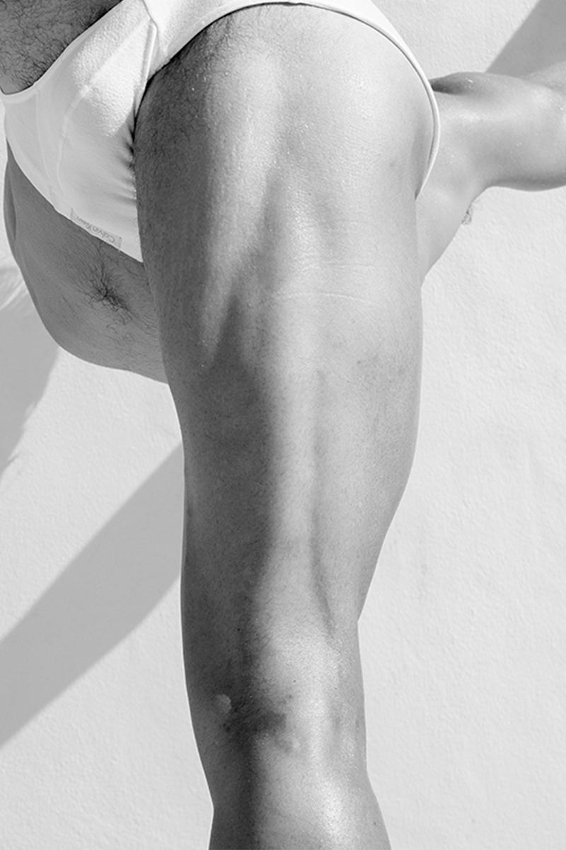 Men Legs, One. Motion Series. Male Nude Black and White Photograph - Gray Nude Photograph by Ricky Cohete