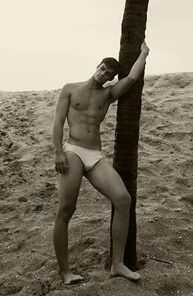 Ricky Cohete - Men and Palm Tree. Sepia Archival pigment print, Medium