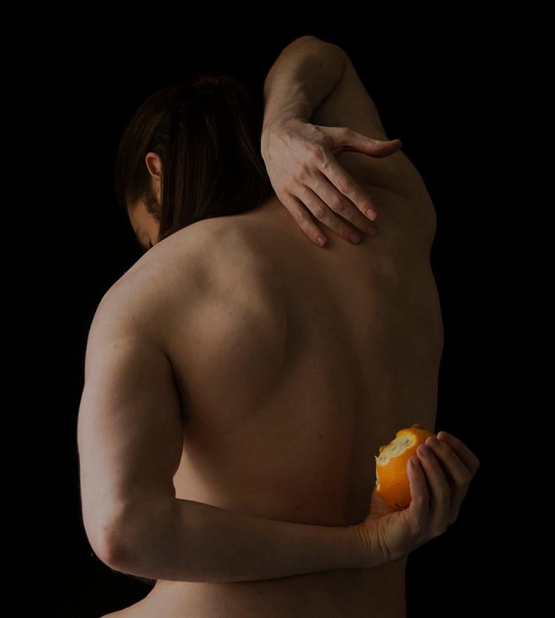 Orange. Figurative Limited Edition Color Photograph - Black Nude Photograph by Ricky Cohete