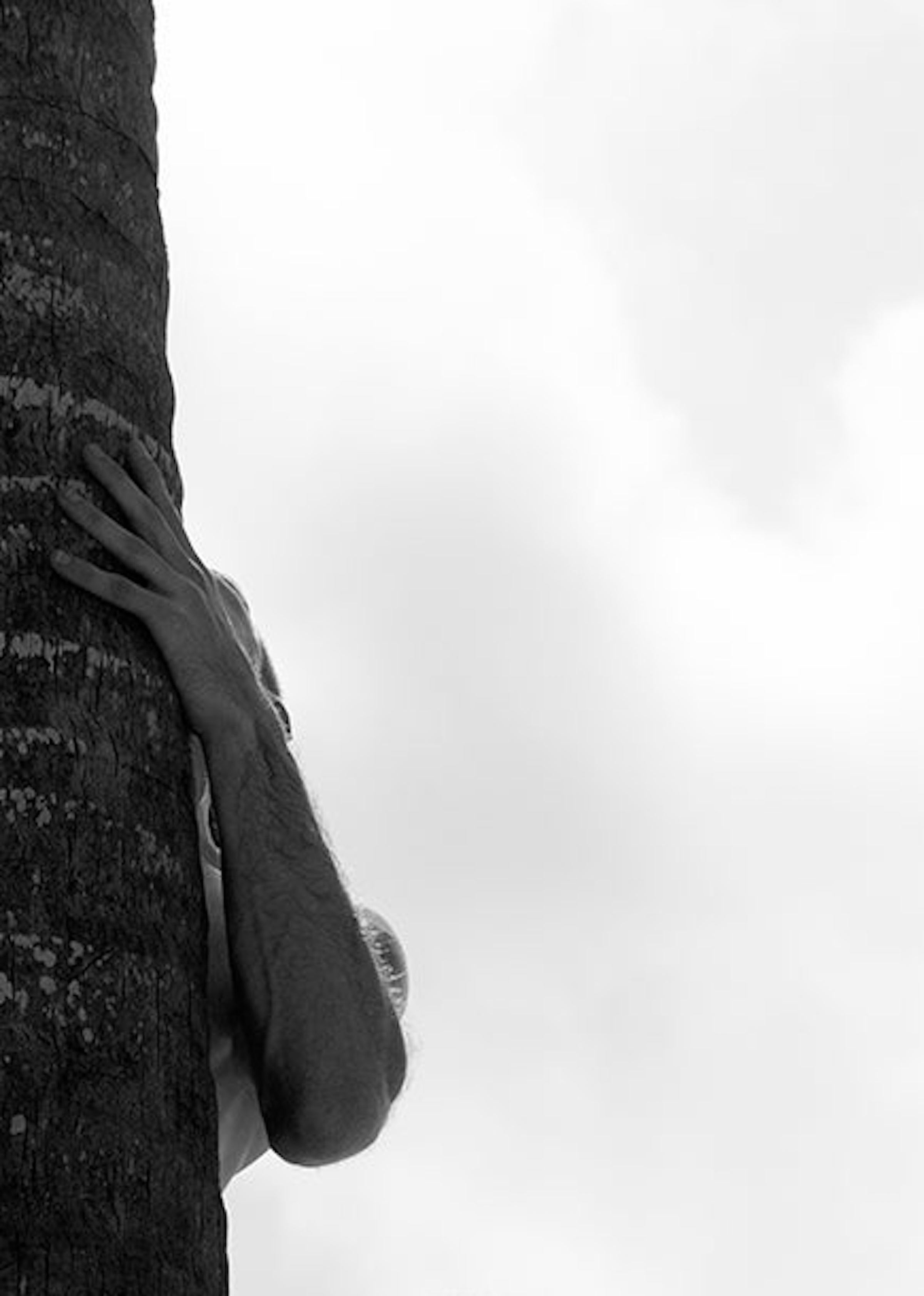 Archival Pigment print
Medium Ed of 10

Palm & Trees: For this series, the artist explores short poems, the expansion of the palms, textures, and ease of the male figure surrounded by the sea and skies. He added that he is always sketching palm