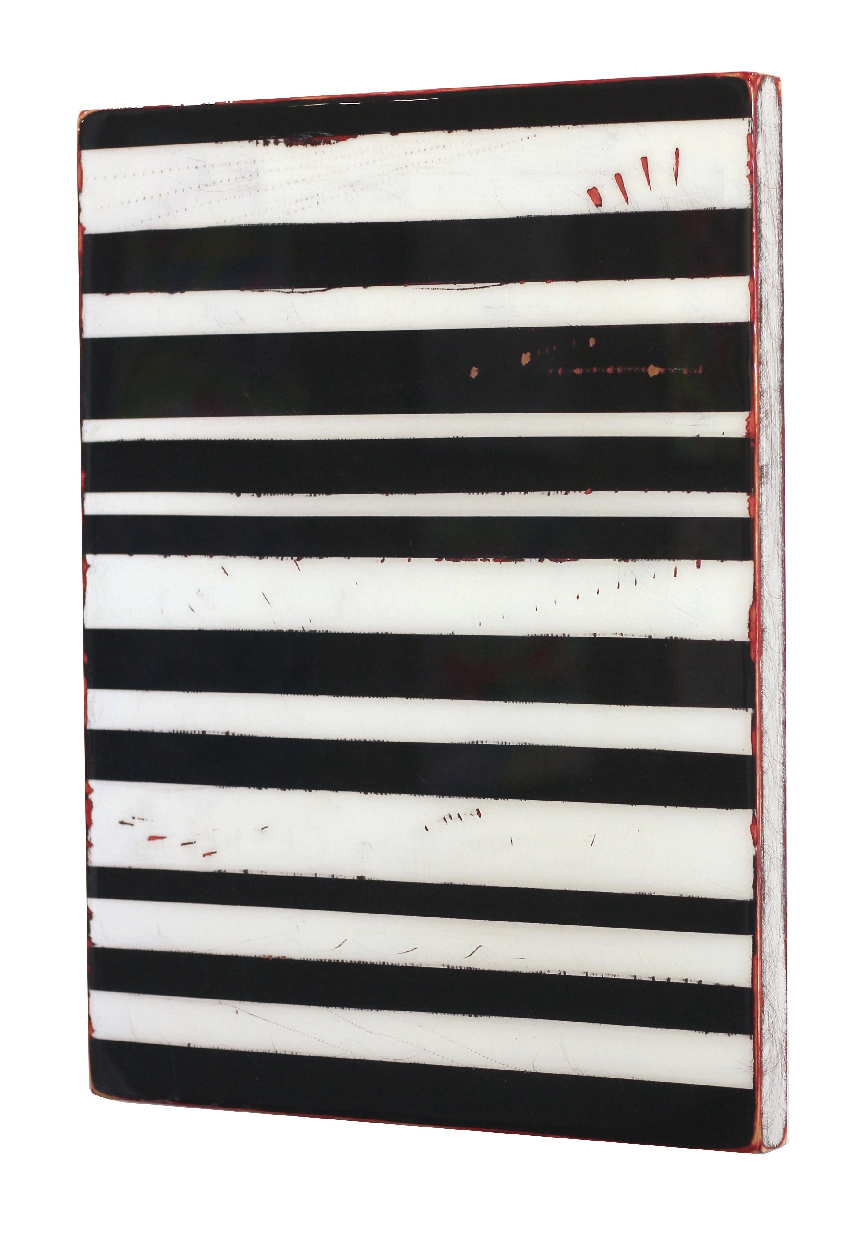 Ricky Hunt’s mixed media minimalism work is influenced by his tumultuous past that led to a paradigm shift in creativity and life. He covers the wood panel with layers of acrylic paint, removing some layers in the process to reveal the underlying