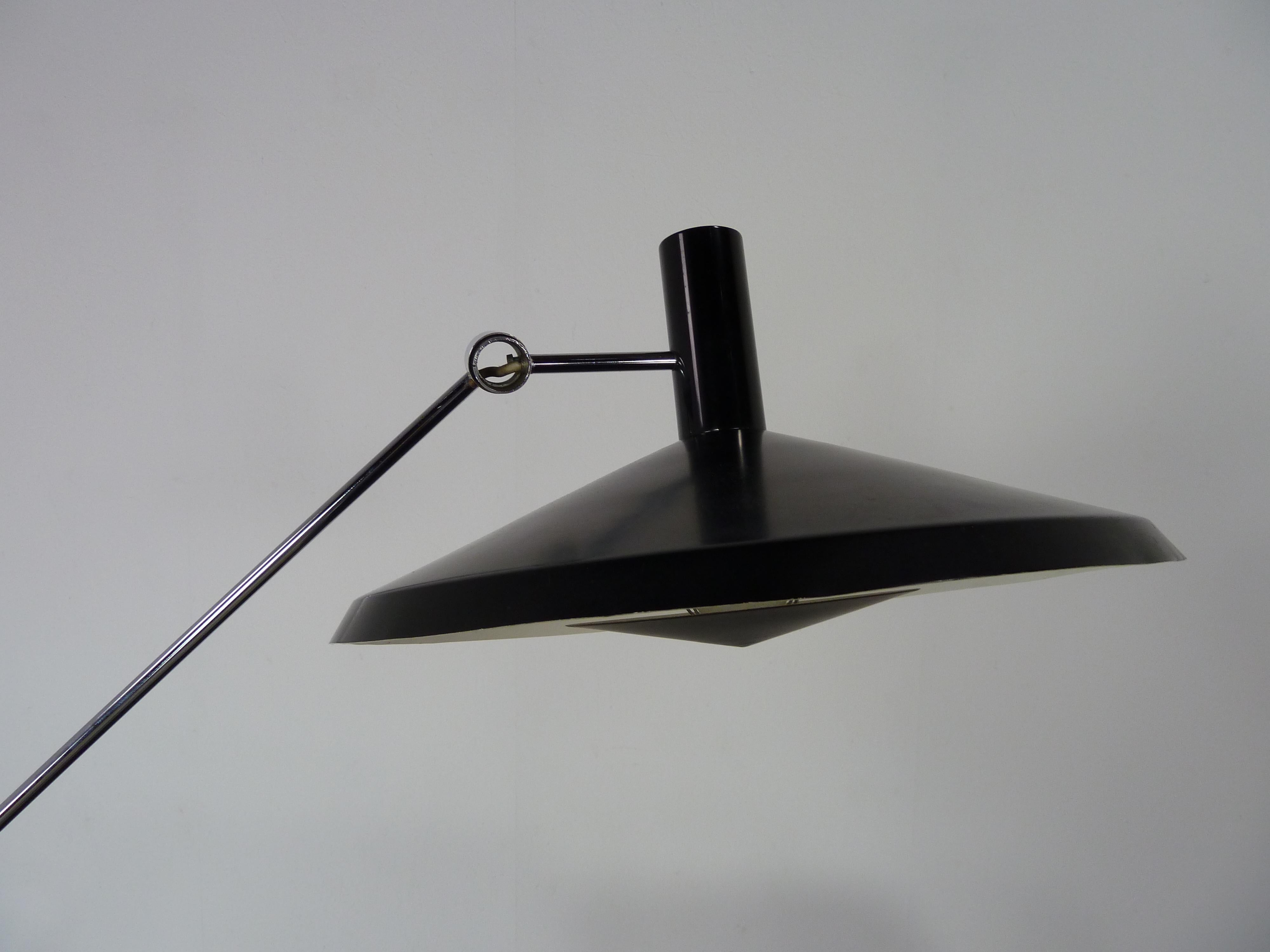 Design from 1950,Redesign 1960 by Rico Baltensweiler this is a very fine example of a high quality modernist articulating floor lamp which can be adjust in a lot of positions.
  
