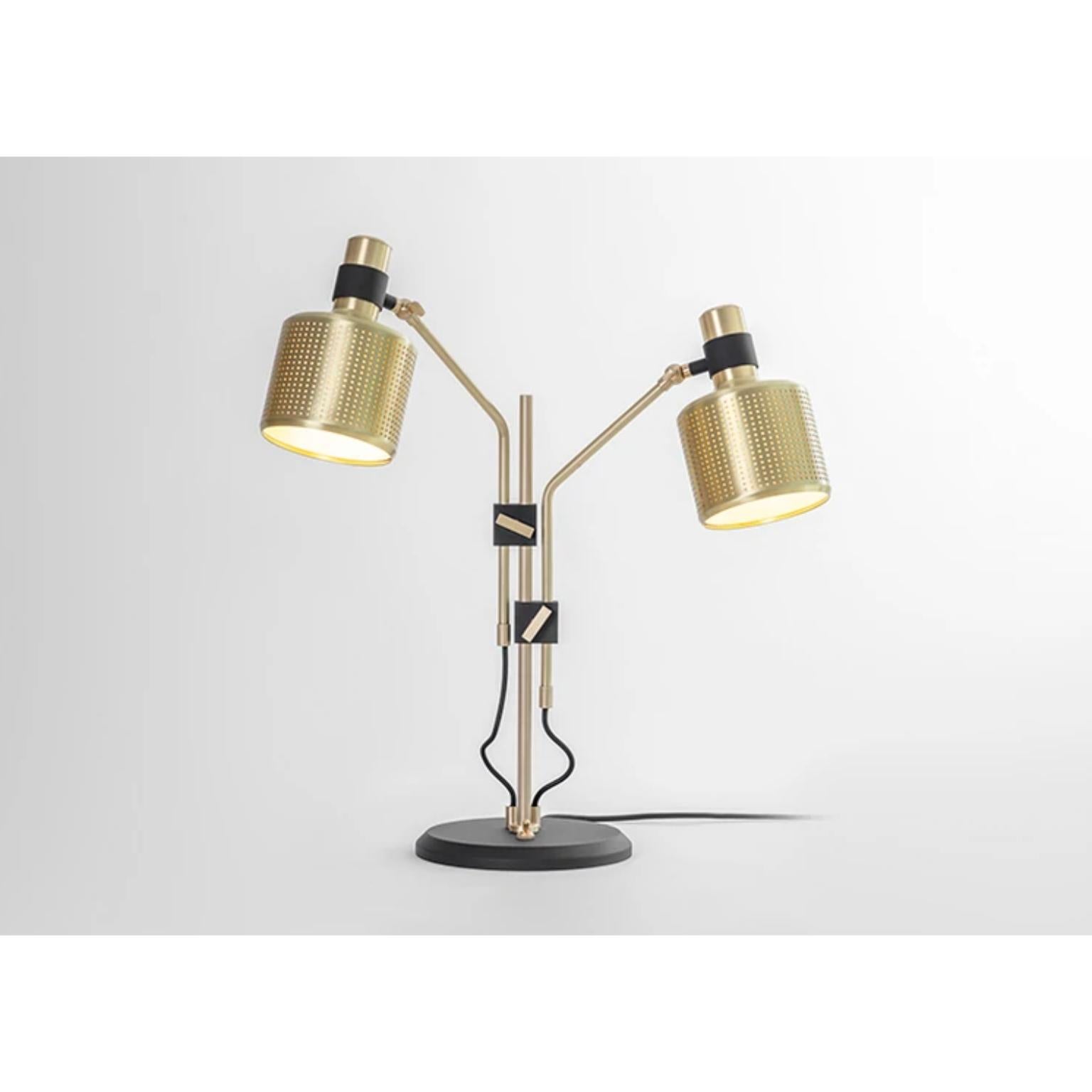 Riddle Double Table Lamp by Bert Frank
Dimensions: 20 x 50 x 55 cm 
Materials: Brass 

All our lamps can be wired according to each country. If sold to the USA it will be wired for the USA for instance.

When Adam Yeats and Robbie Llewellyn