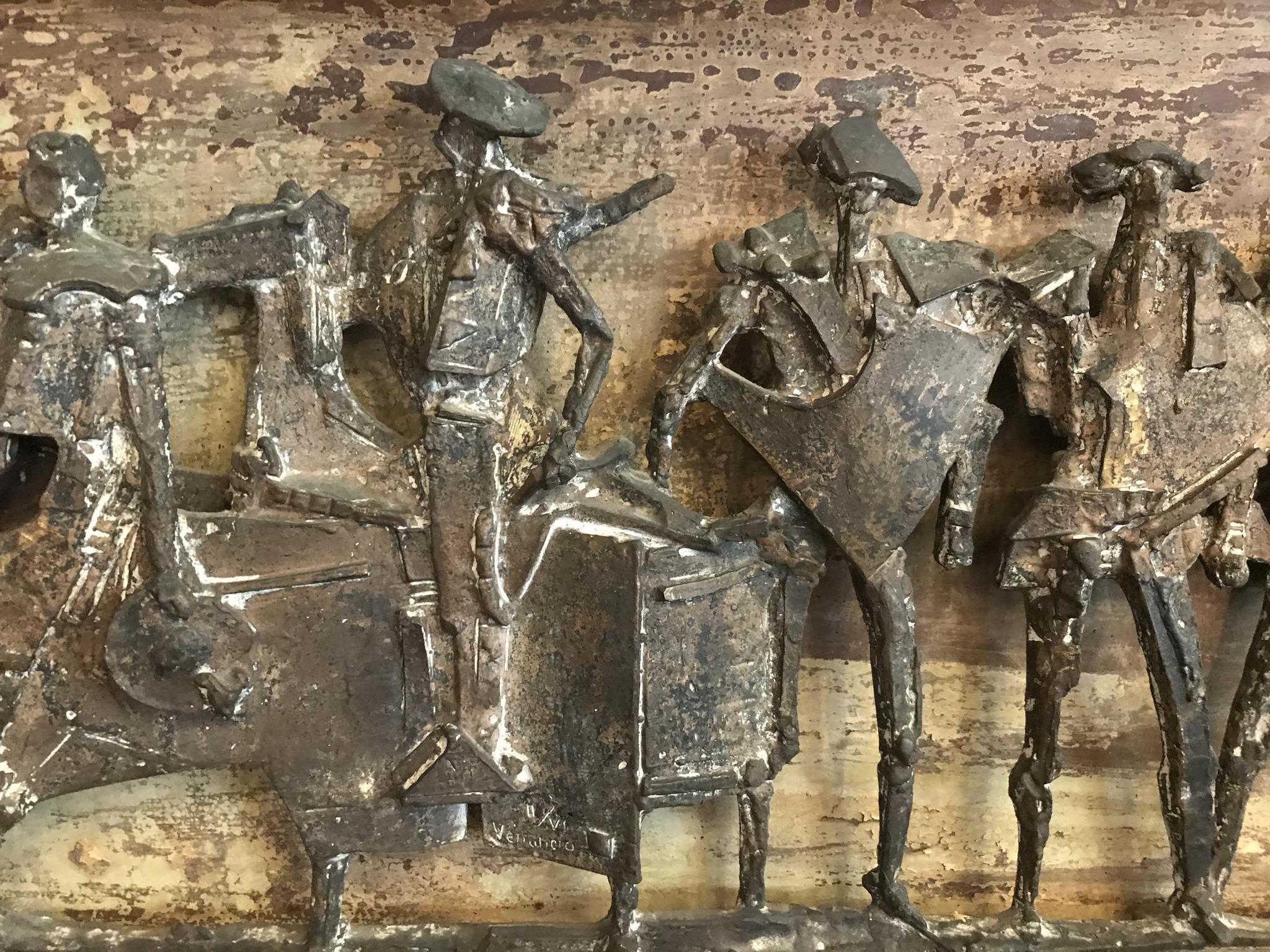 Escultura mural de bronce patinado 