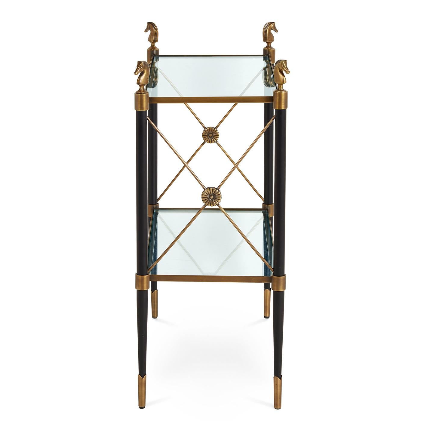Parisian Flair. A fab storage solution for an entryway or a bathroom, our Rider two-tier side table is an updated take on French Empire style. Blackened brass legs with antiqued brass accents are capped with cast brass horse finials to create a