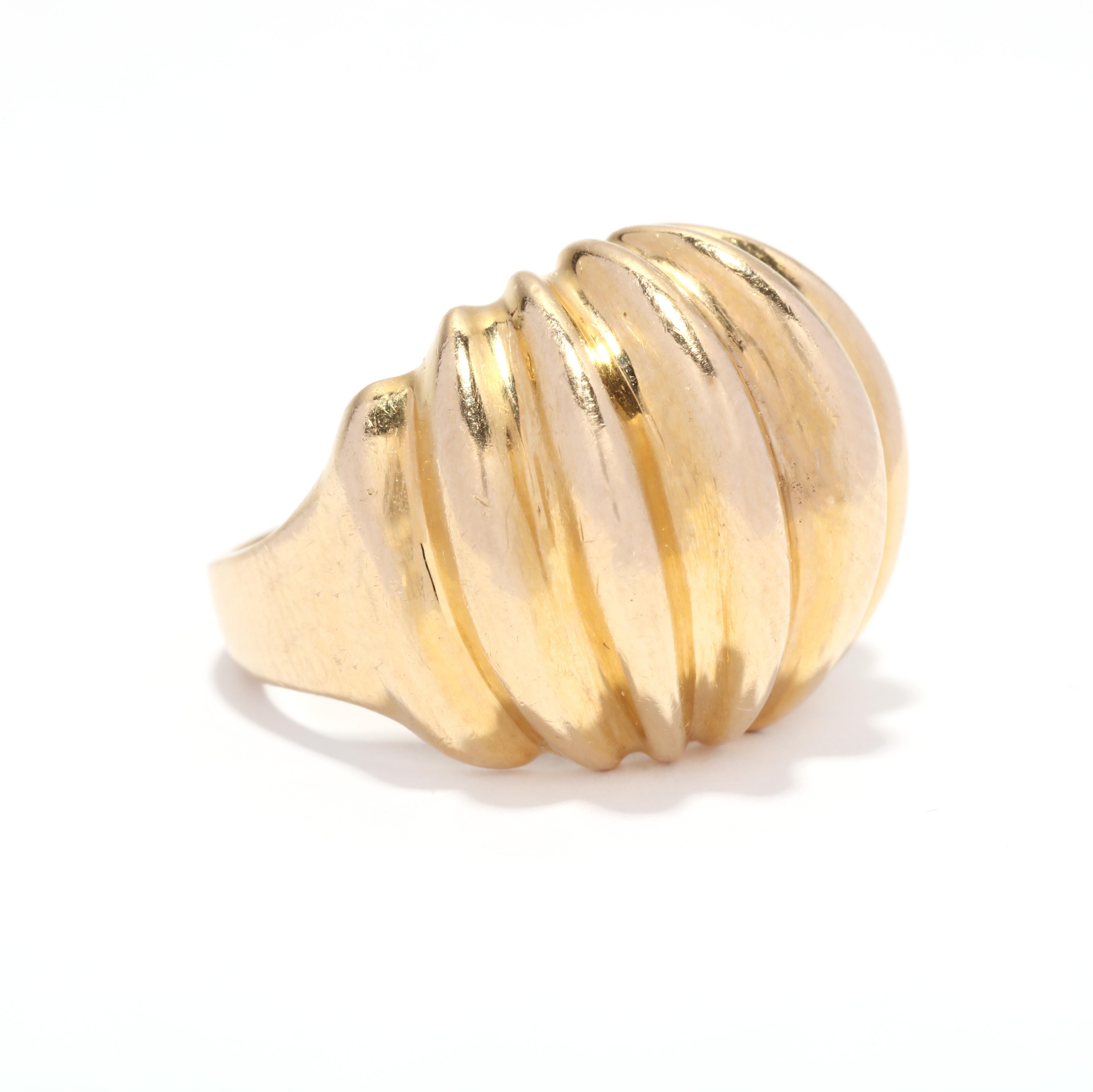 A vintage 18 karat yellow gold ridged dome ring. This ring features a dome design with a deep ridge motif and a tapered band.

Ring Size 5.5

Length: 5/8 in.

Weight: 8.8 dwts.

Ring Sizings & Modifications:
*Please reach out before your purchase