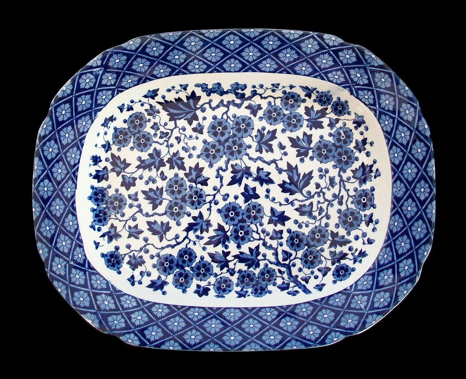 RIDGWAY - 'Hawthornden' - Antique ceramic serving platter - large size - transfer decorated in blue on a cream ground - elaborate floral decoration to the center - floral diamond pattern border - British Victorian registry mark and Ridgway mark on