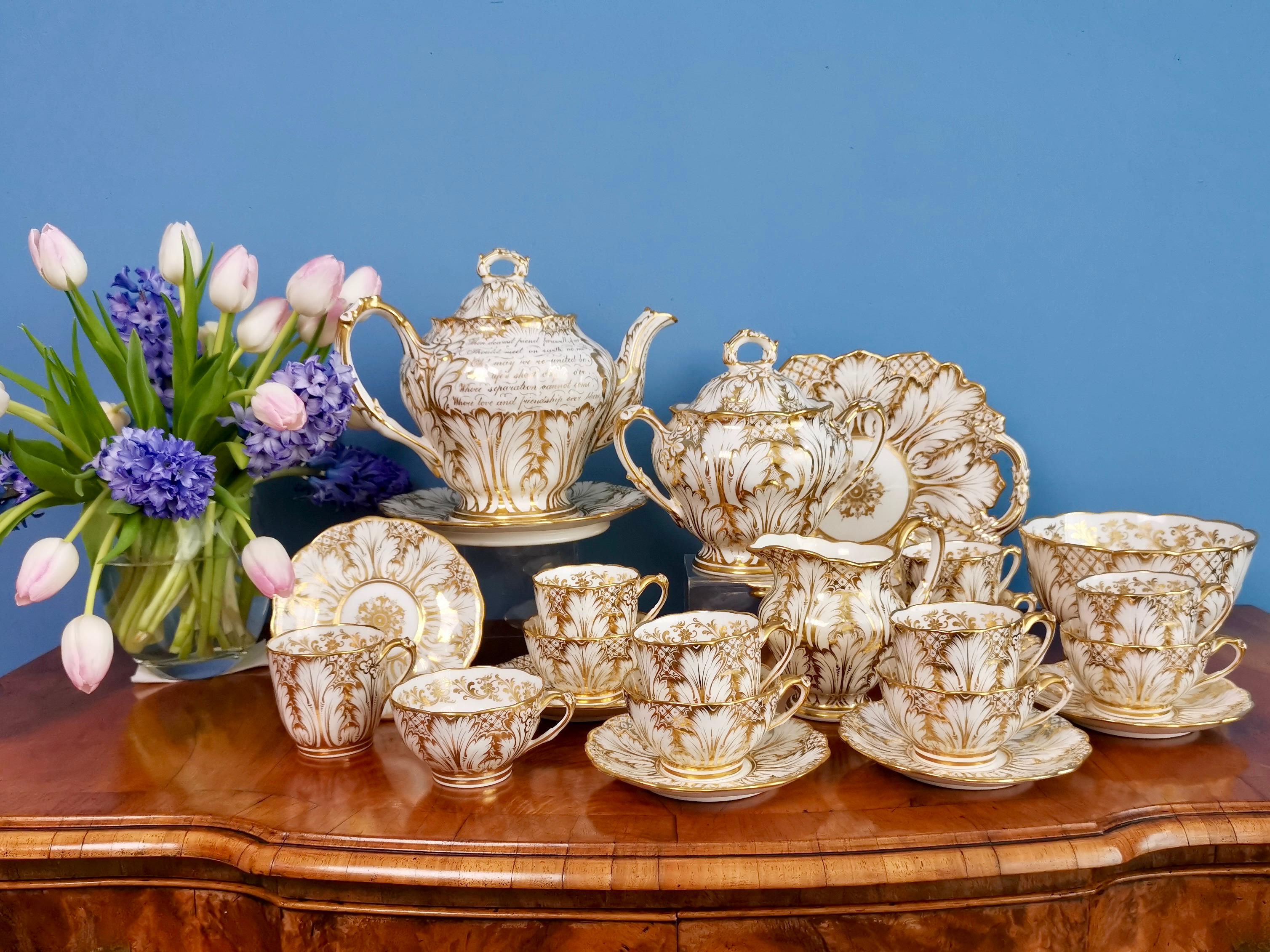 This is an absolutely stunning tea service made in 1853 by Ridgway. The service consists of a teapot with cover on a stand, a sucrier with cover, a milk jug, a slop bowl, a large cake plates and six true trios, each consisting of a teacup, a coffee