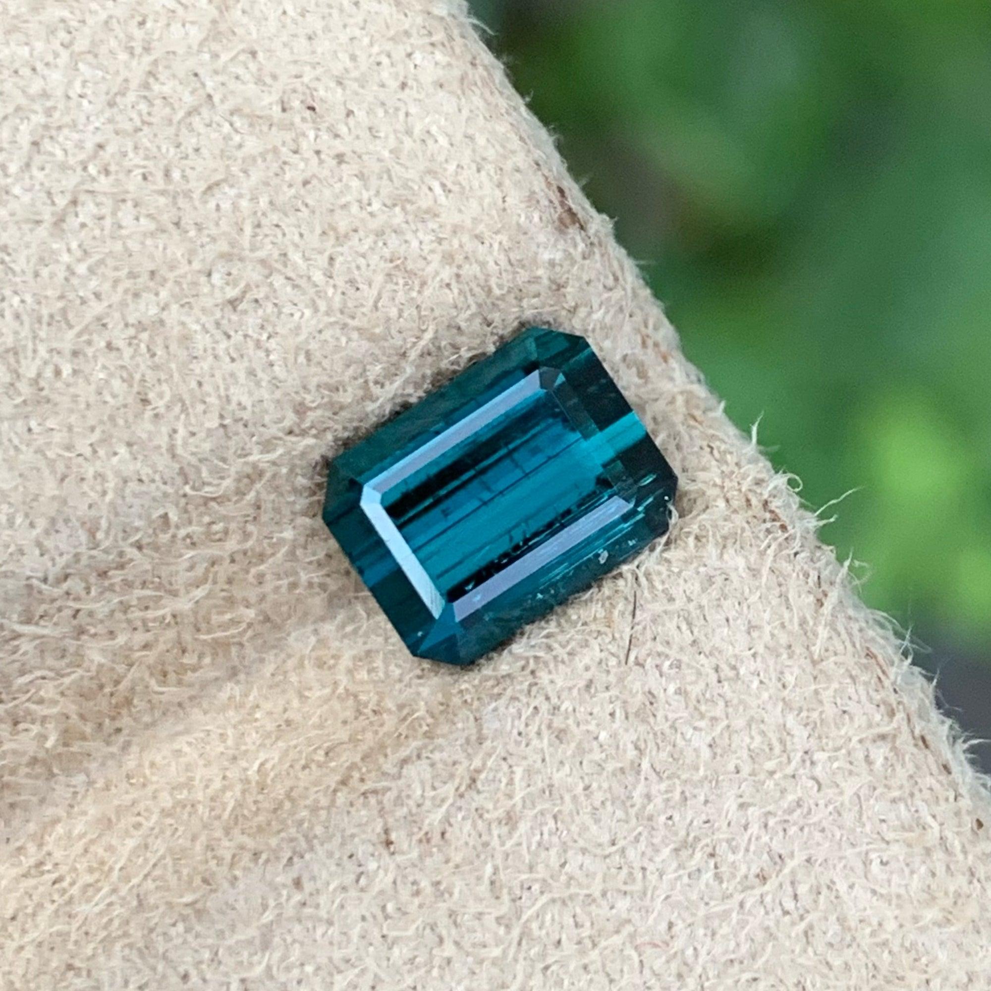Deep Indicolite Loose Tourmaline of 1.80 carats from Madagascar has a wonderful cut in a Octagon shape, incredible greenish-blue color. Great brilliance. This gem is  SI Clarity.

Product Information:
GEMSTONE TYPE:	Ridiculously Deep Indicolite
