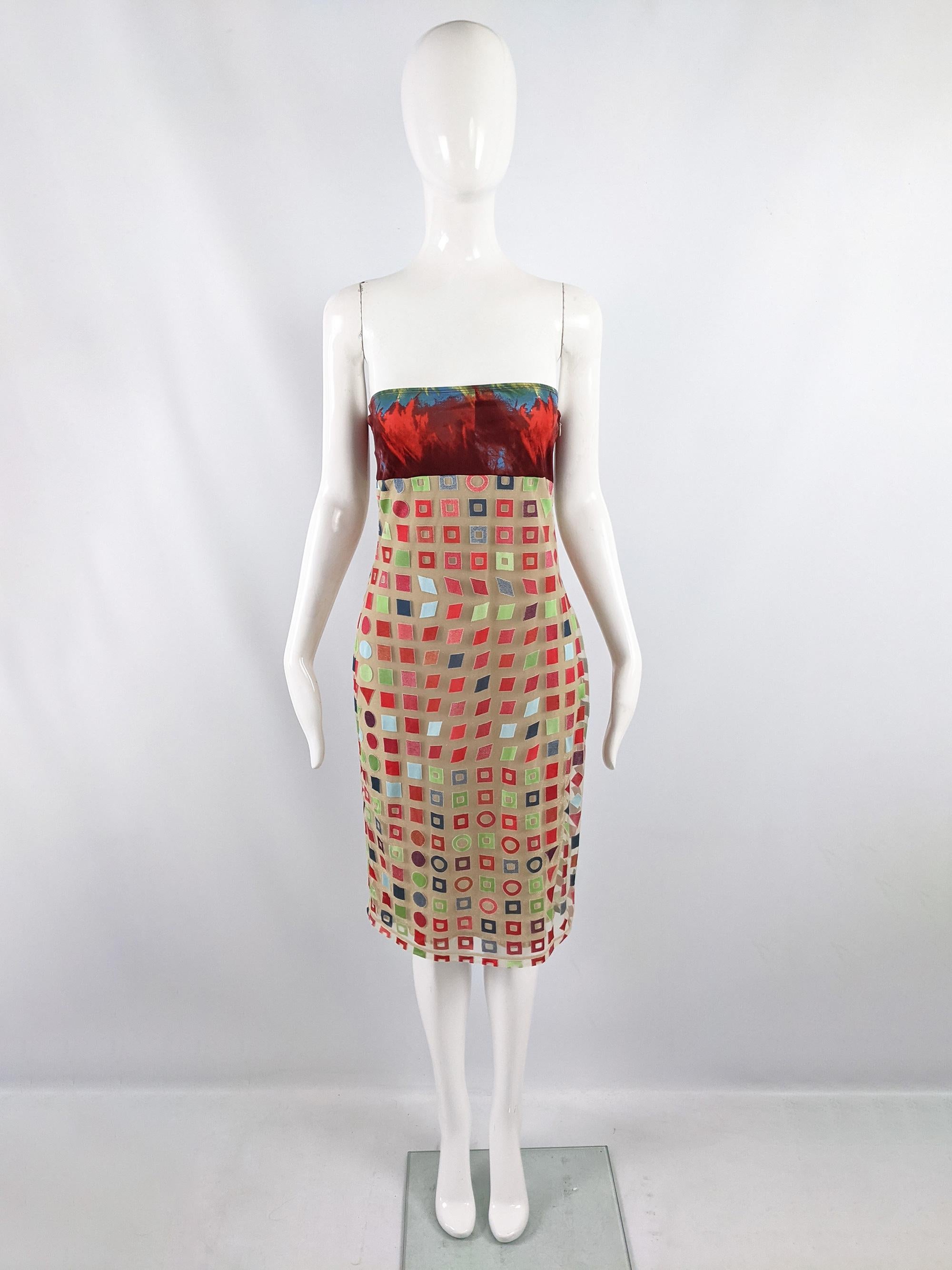 A beautiful vintage y2k womens party dress from the spring summer 2001 collection by luxury British fashion designer, Rifat Ozbek. In a semi sheer mesh overlay fabric with geometric jacquard symbols throughout, a synthetic knit on top and a gold