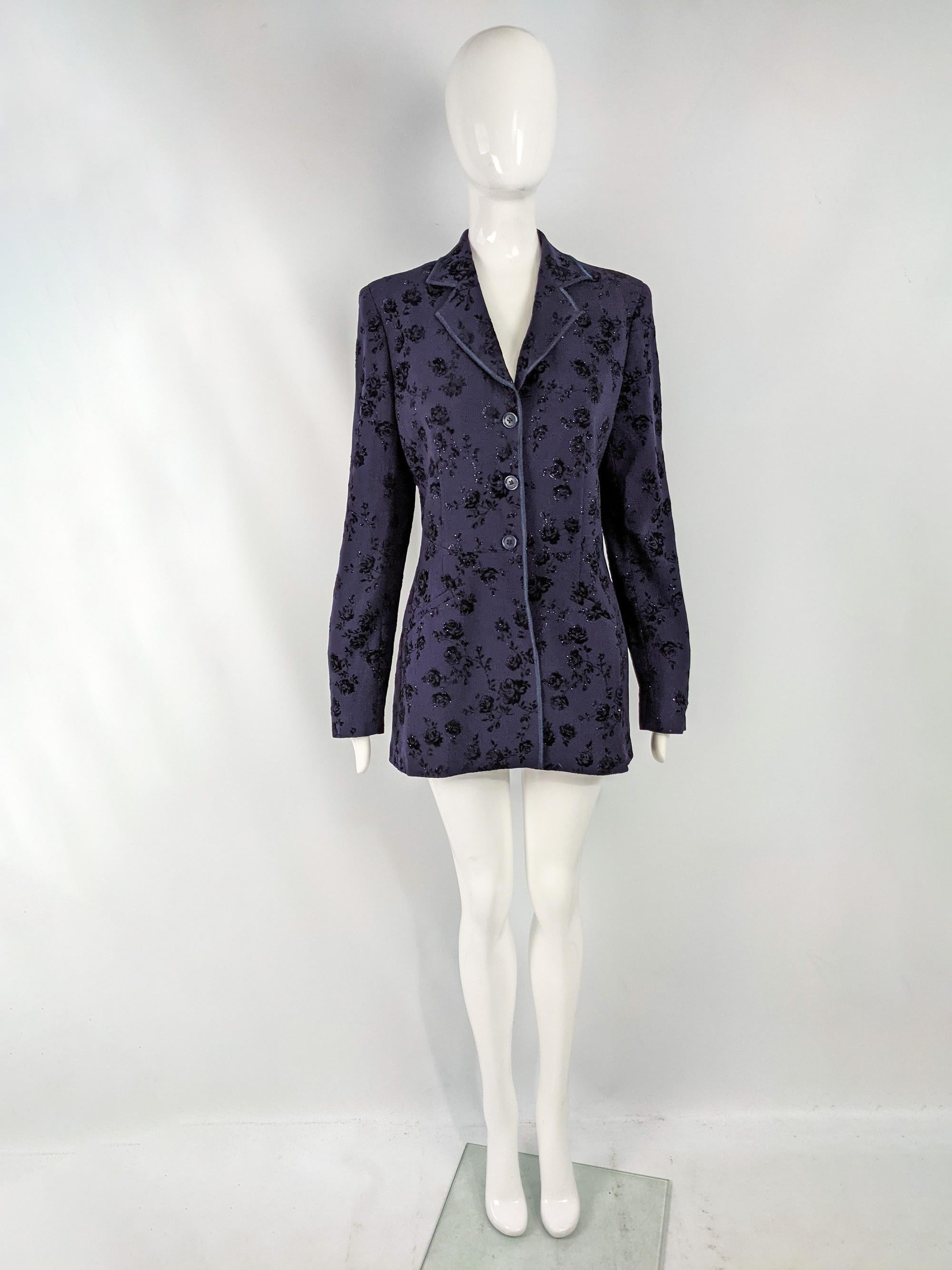 A beautiful vintage womens blazer jacket from the 90s by luxury fashion designer, Rifat Ozbek for the Future Ozbek line. In a dark purple (with a blue tone, almost navy) with a sparkly flocked velvet floral pattern, would make a great evening