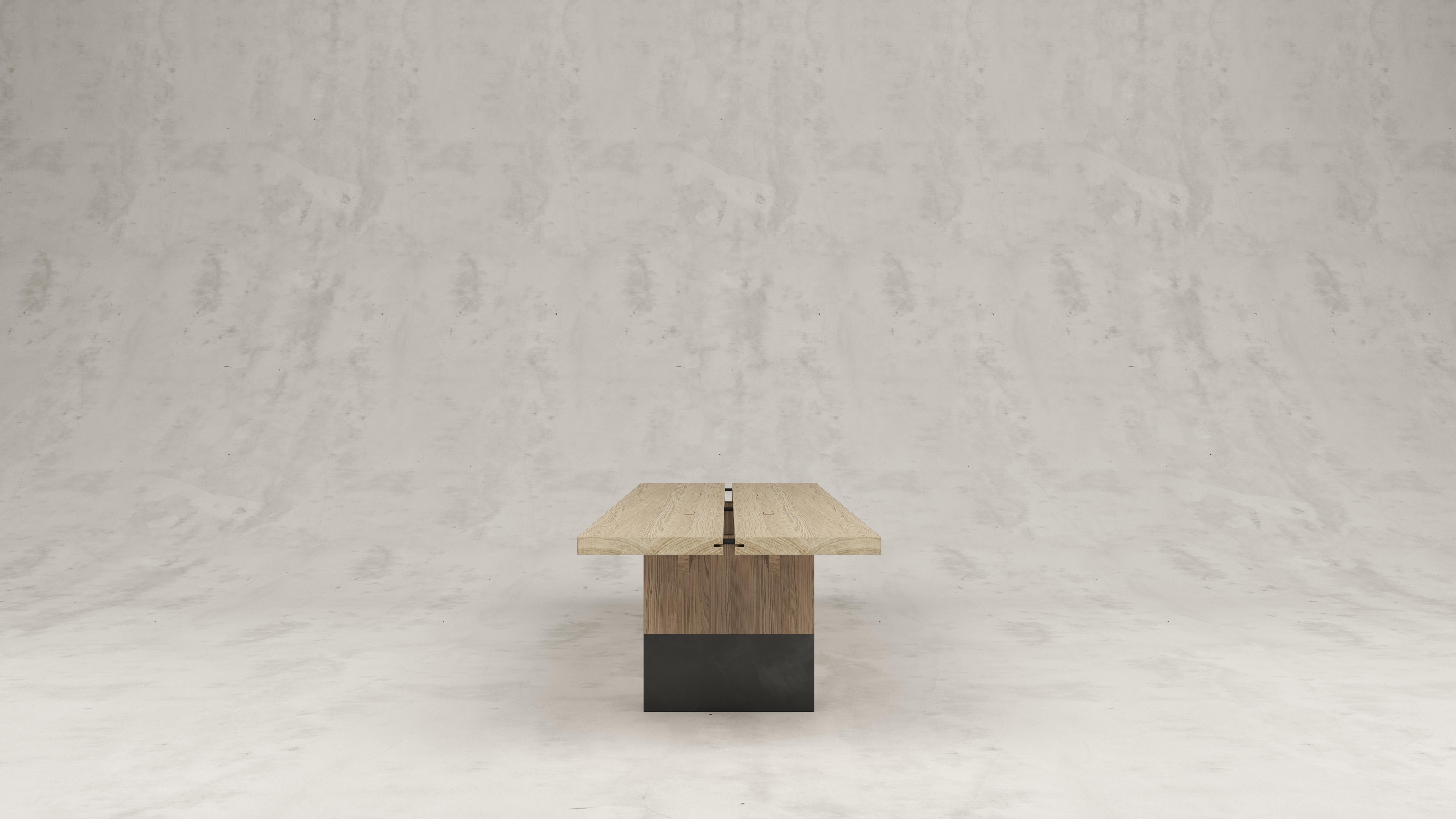 Rift wood and metal dining table by Andy Kerstens
Without little feet
Dimensions: W 240 x D 98 x H 74 cm
Materials: Bleached Oak, Powder coated inox
Optional little feet at table legs.
Handmade in Belgium

Available in Solid Larch, Oak and