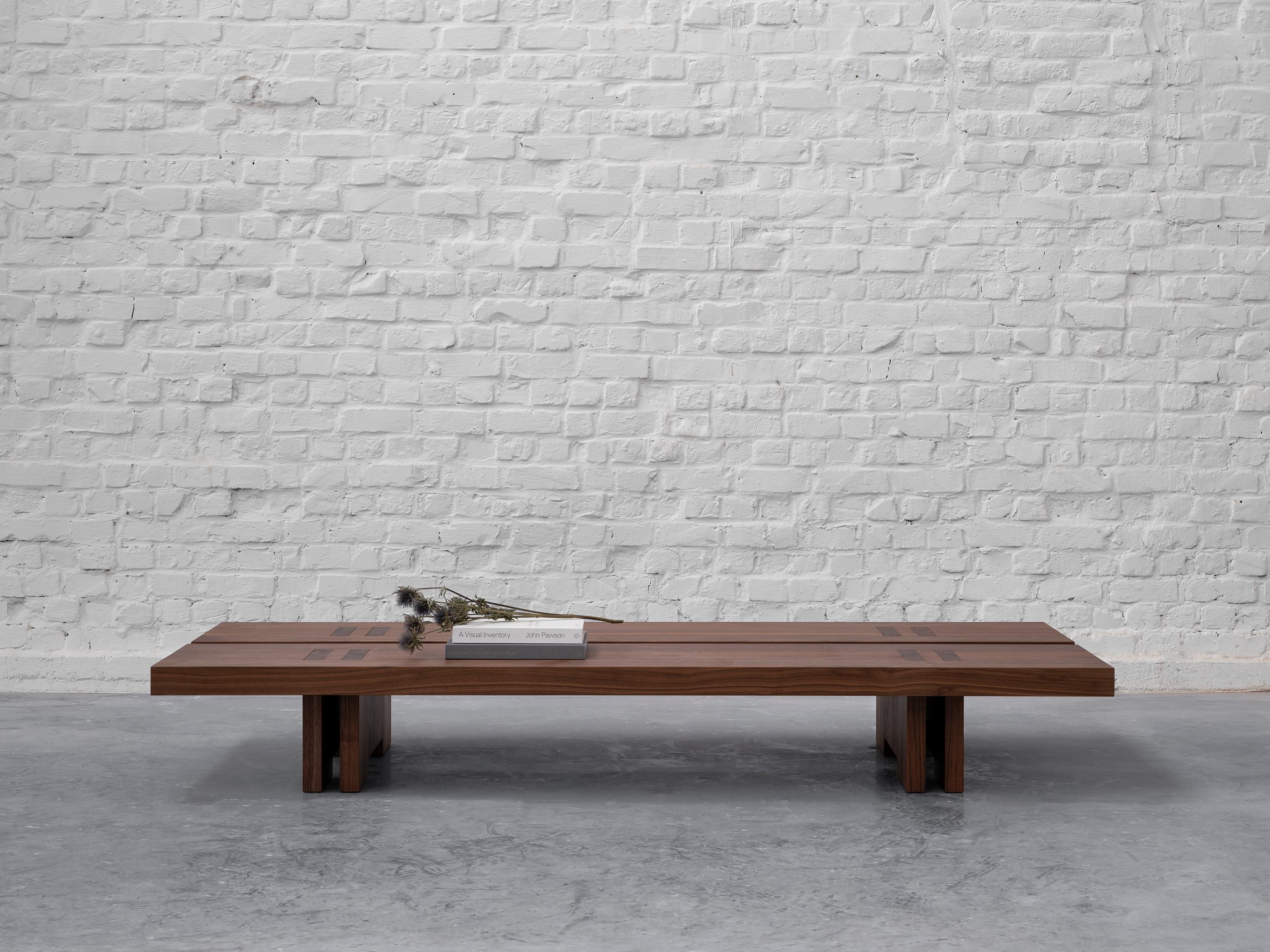 Rift wood coffee table by Andy Kerstens
Dimensions: 160 x 82 x 28 cm
Materials: Walnut
Handmade in Belgium

Available in Solid Larch, Oak and Walnut and various sizes.

The design was created by the need for a simple esthetic with an honest