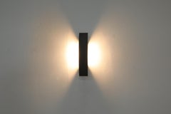 1990s Paolo Zani 'Riga' Wall Sconce for Fontana Arte, Curved Metal Shade