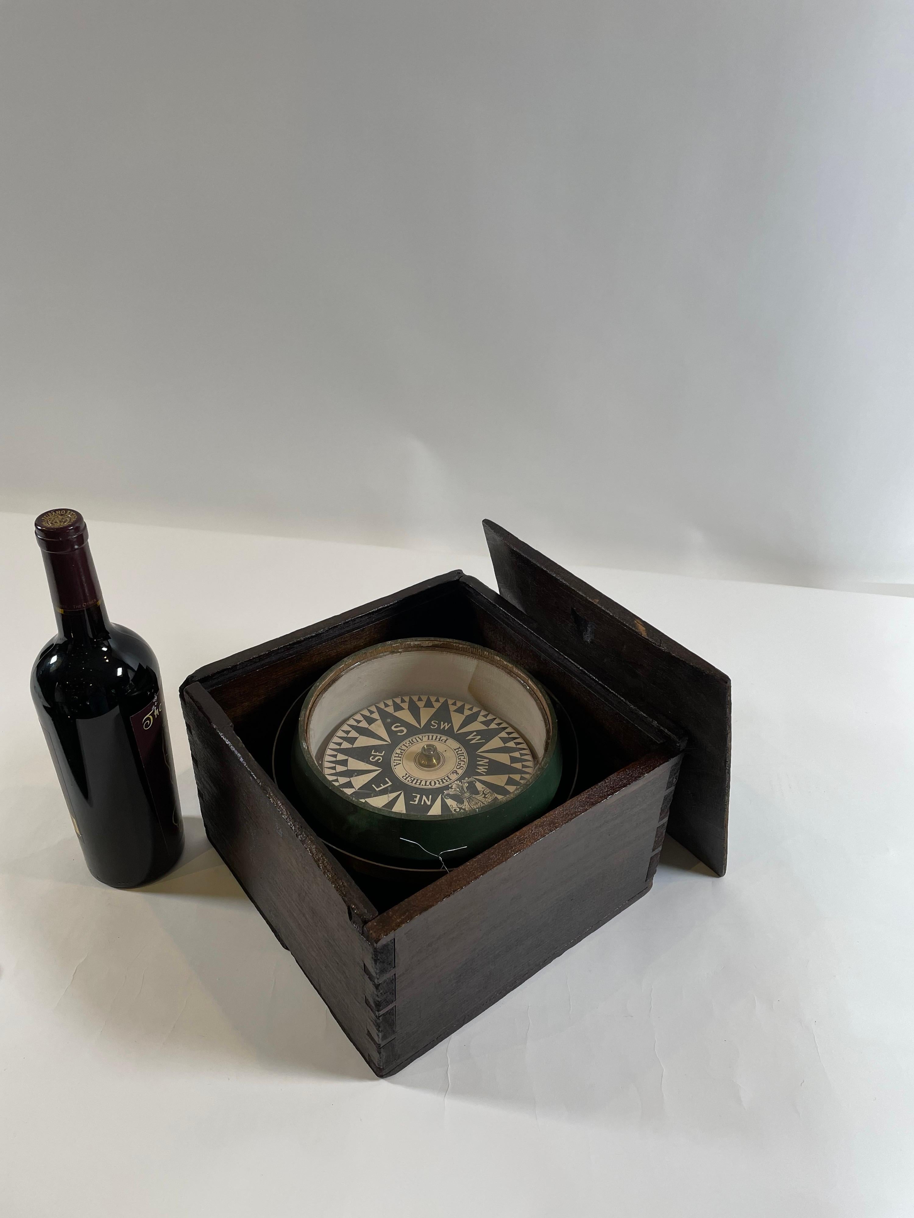 Boxed mariners compass from the mid-19th century with wood bowl, dry card, from maker Riggs and Brothers of Philadelphia. Weight is 6 pounds.