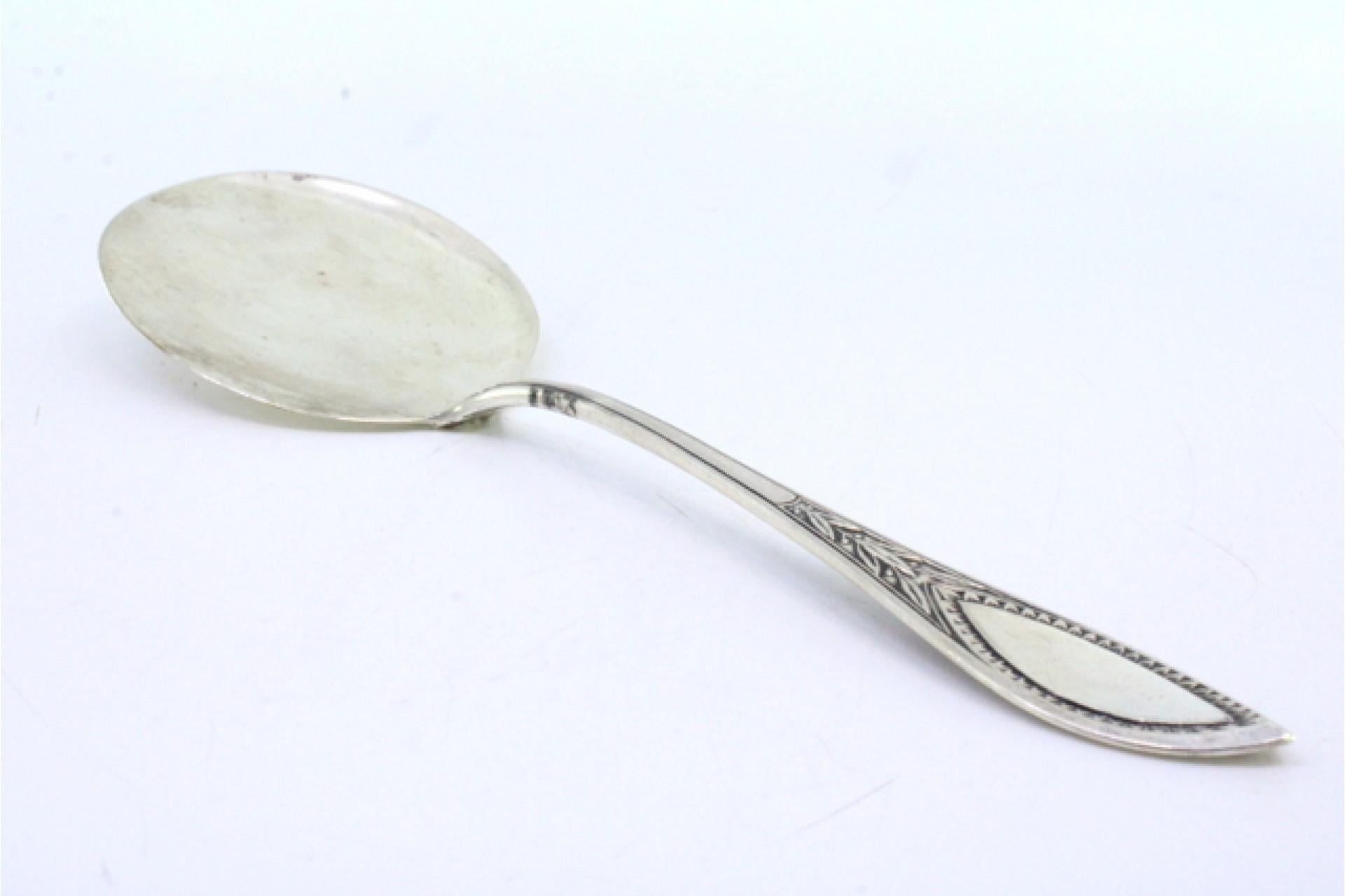 Right-handed silver ice cream scoop with grooved handle and monogram Europeo en venta