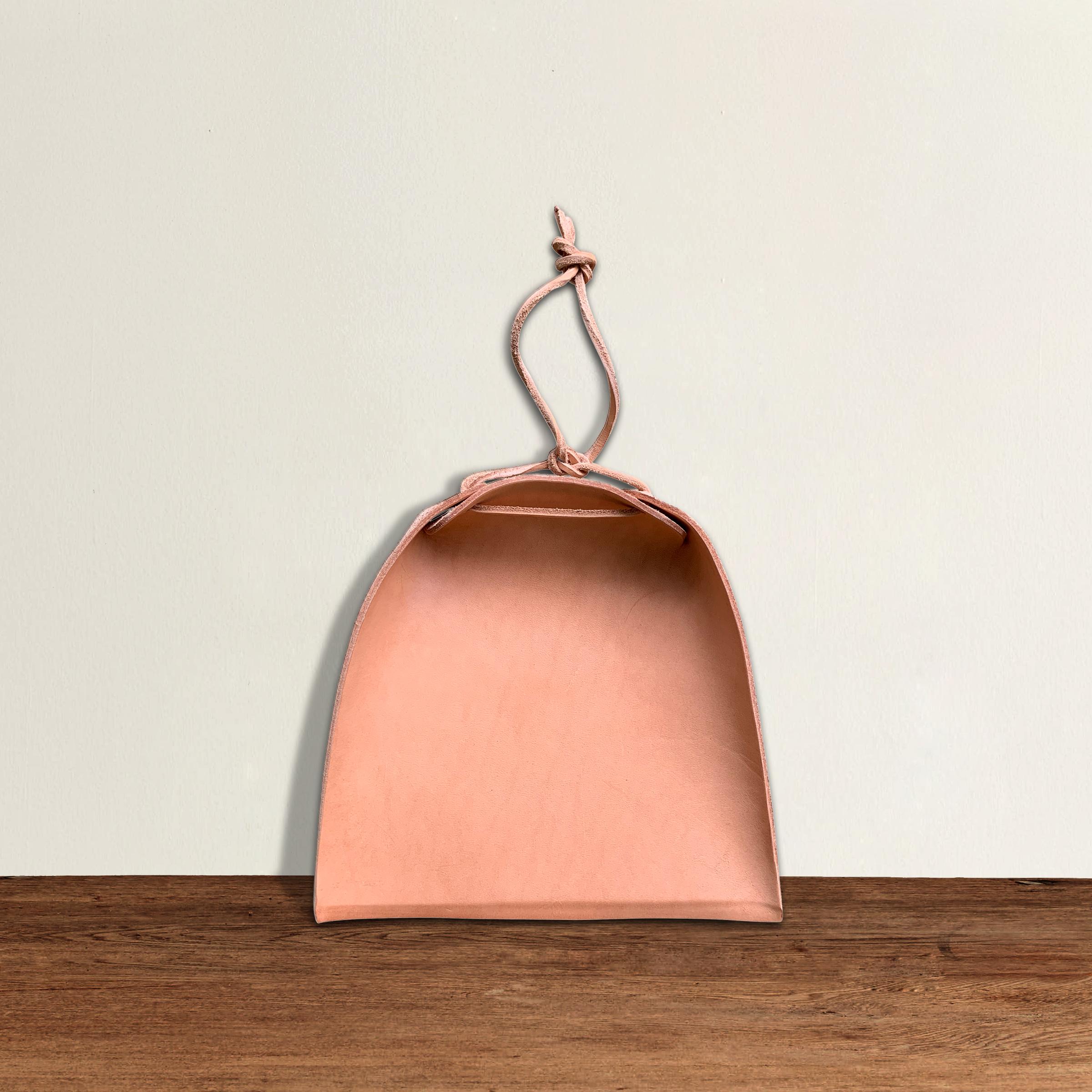 Handmade by artisans in rural Kentucky, our Right Proper leather dustpan was crafted with shaker design principles in mind: “Don't make something unless it is both necessary and useful; and if it is both necessary and useful, then make it