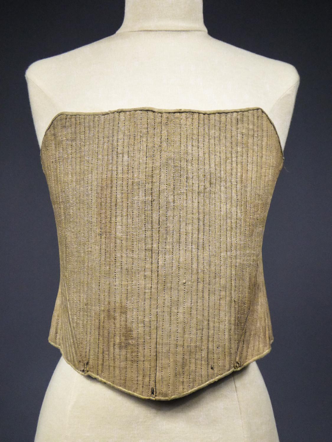 Circa 1730
France

Rare rigid Whale Boned Bodice in linen and hemp dating from the Louis XV period. Precious work of whalebone embroidery, stitched with a back stitch between a 