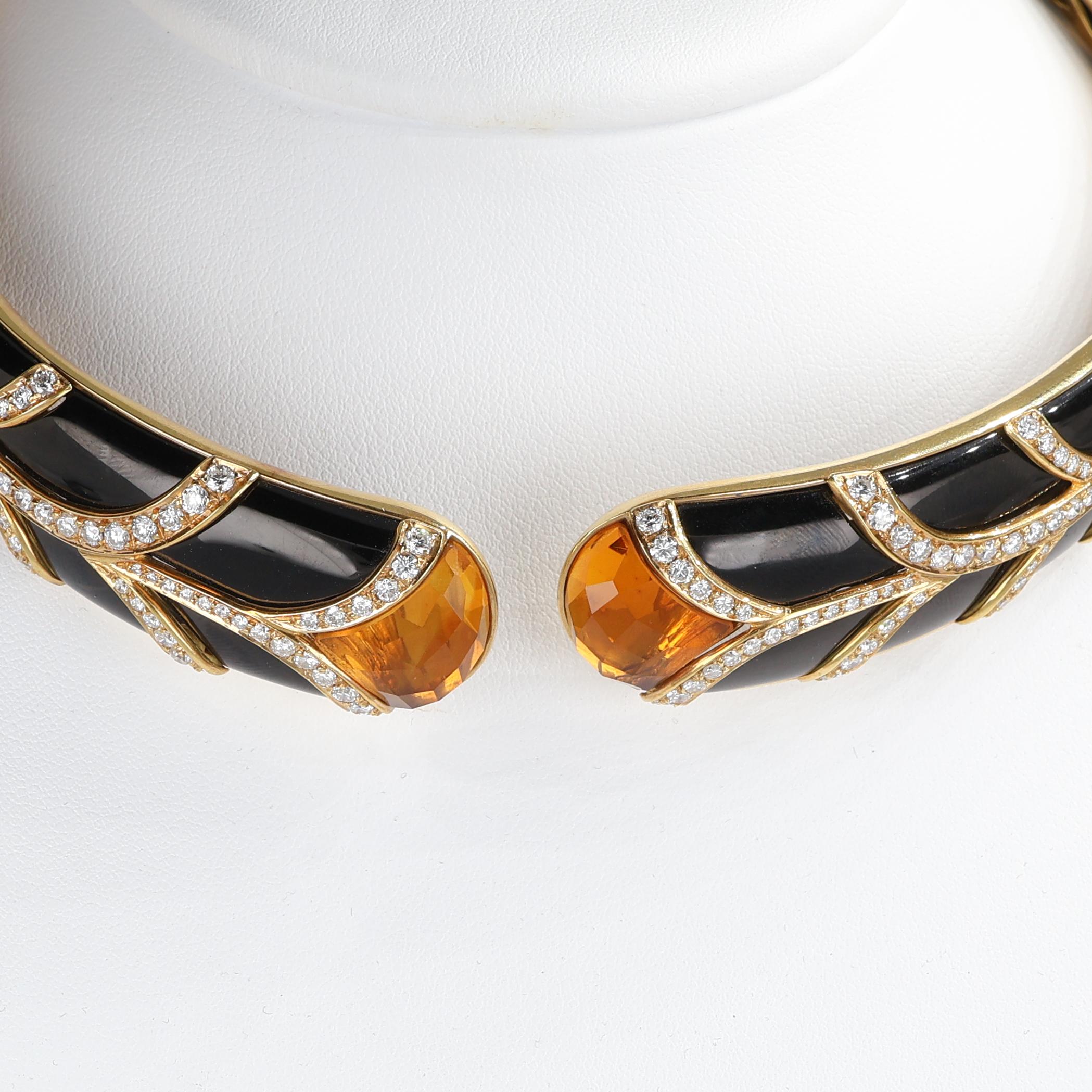 A statement piece of timeless elegance, this rigid choker is crafted in 18kt yellow gold with black enamel detailing and a striking combination of white brilliant-cut diamonds and faceted topaz. The fluid, sculptural design enhances its luxurious