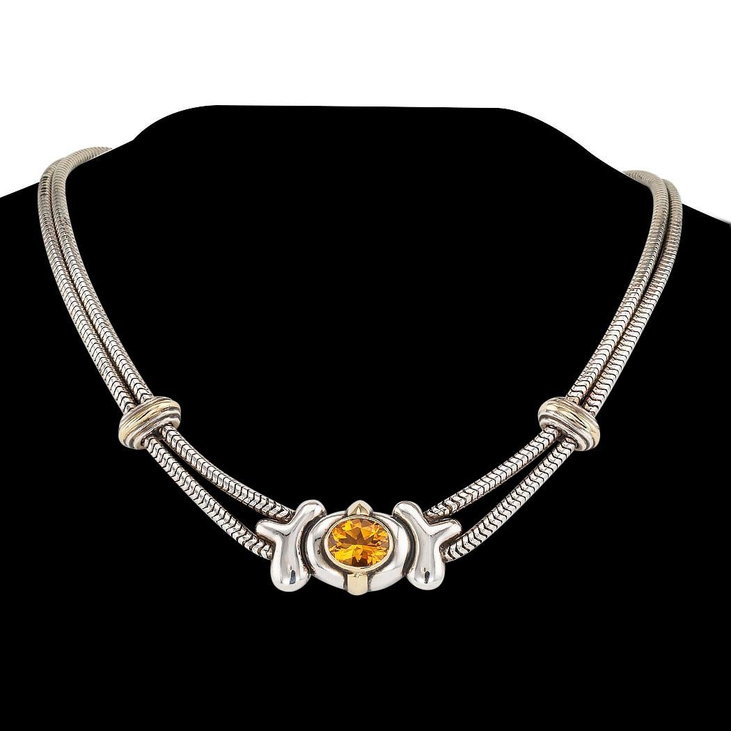 Rigoberto citrine sterling silver and yellow gold necklace.  Love it because it caught your eye, and we are here to connect you with beautiful and affordable jewelry.  Decorate Yourself!  Simple and concise information you want to know is listed