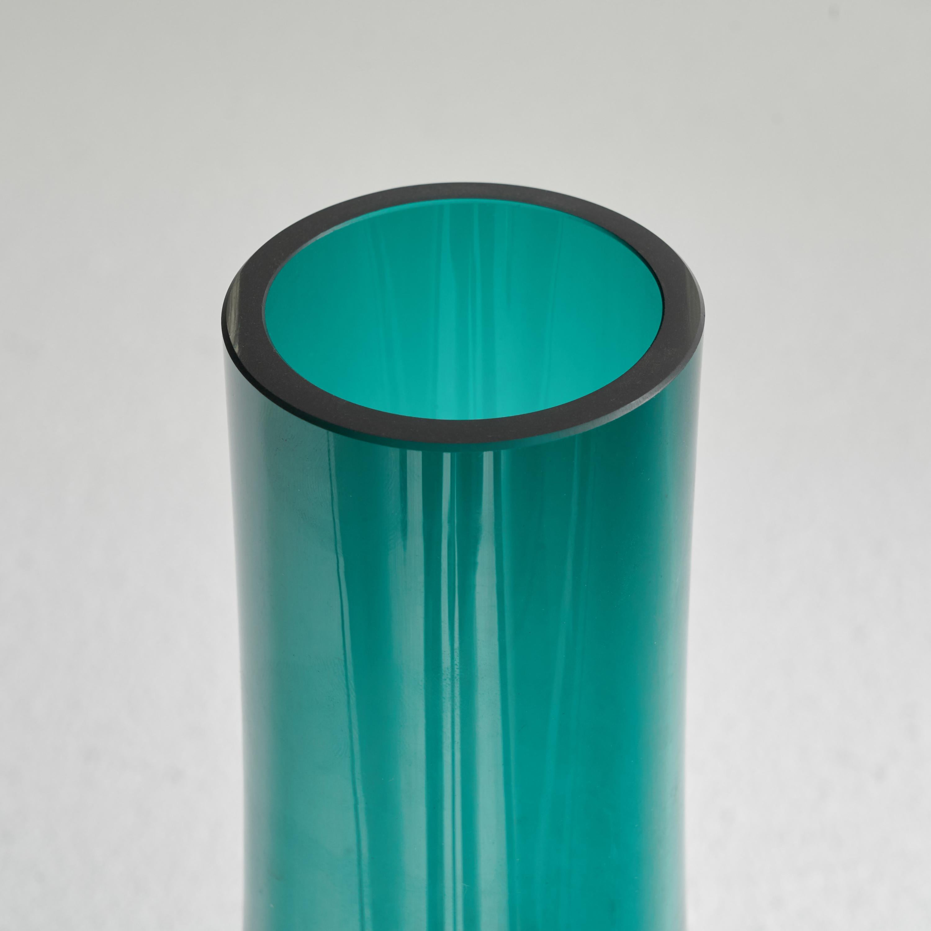 Riihimäen Lasi Oy tall Modernist glass vase. Finland, mid 20th century. 

Beautiful mid-century modernist art glass vase from Finland. Magnificent color and shape, making it a very interesting piece of glass art. Made by Riihimäen Lasi Oy /