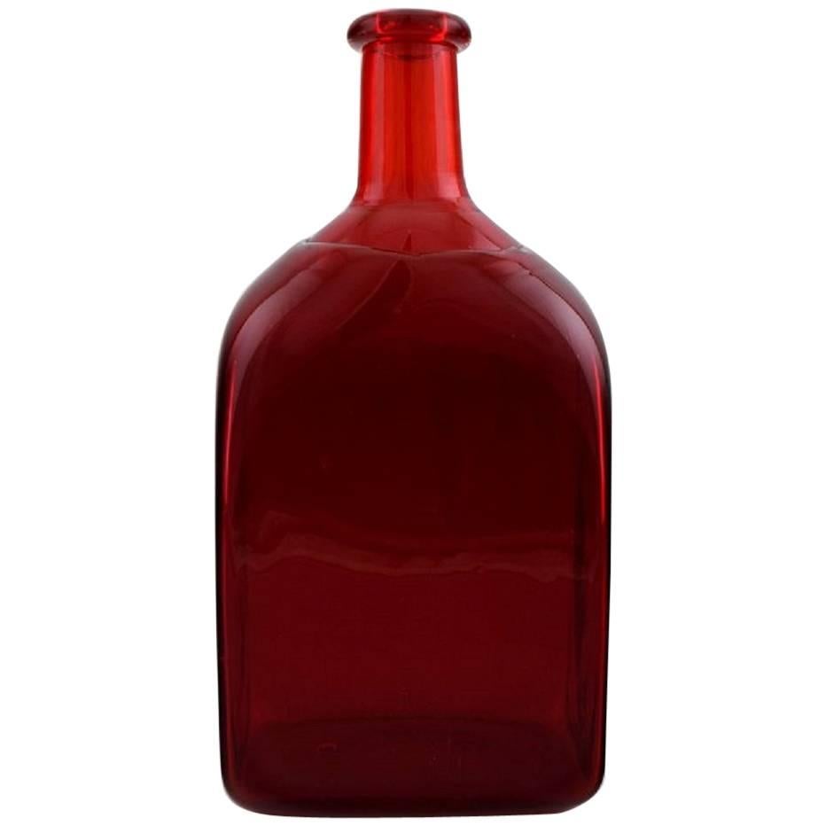 Riihimaki Riihimaen:: Finlande:: carafe/bouteille en verre d'art rouge:: années 1960