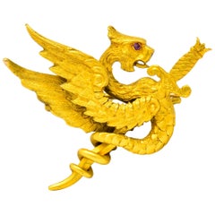 Antique Riker Brothers Art Nouveau 14 Karat Gold Slayed Dragon Brooch, circa 1900
