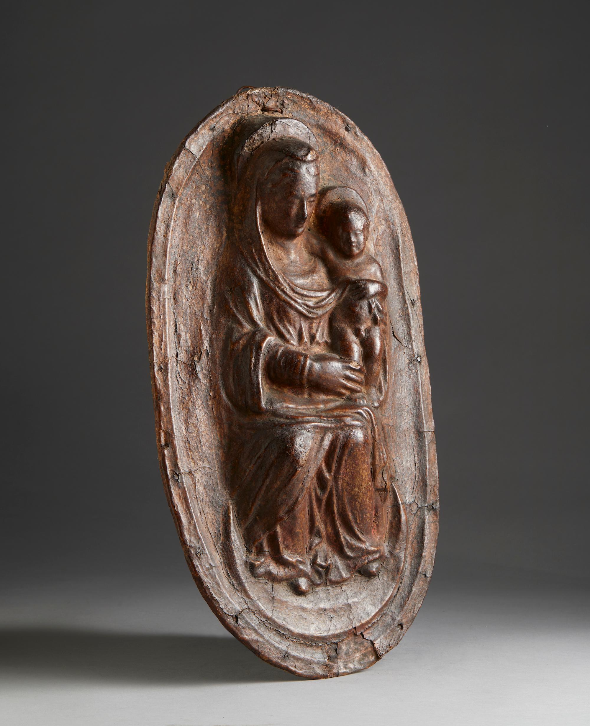 Madonnna with Child

Leather relief depicting Madonna Enthroned with Child on her lap.

Formerly encased and fixed on a papier background.

Visible beneath the surface patina are traces of ancient gilding.

Emilia, 17th century.

cm 45,2 x 25,4

The