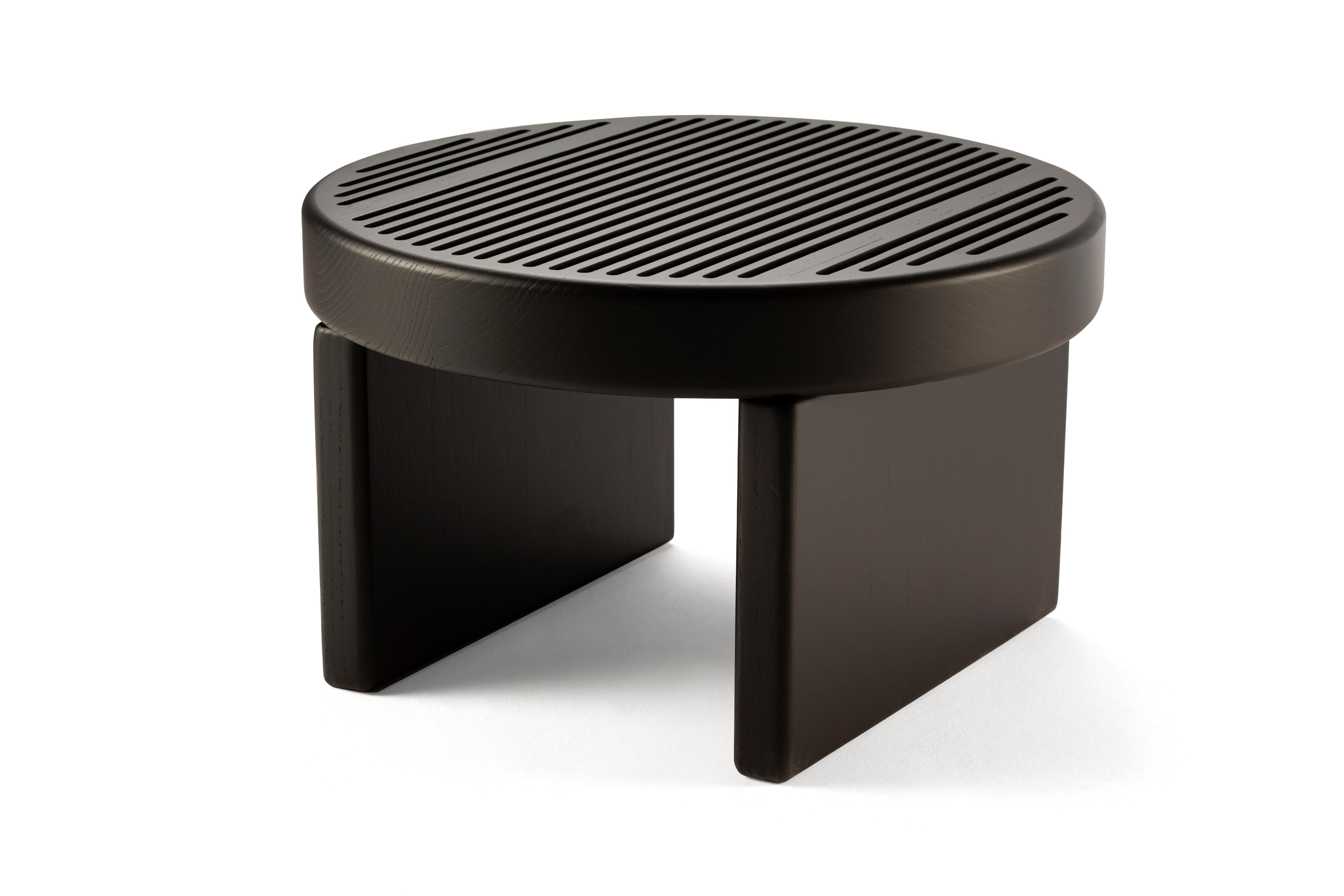 Contemporary Modern Rillo Big Table by Collector Studio

Rillo is a solid wood side table, softened by its straight lines sliced top. It has pure shapes and flowing surfaces.
It come in two heights, multiplying its possible uses, such as a
