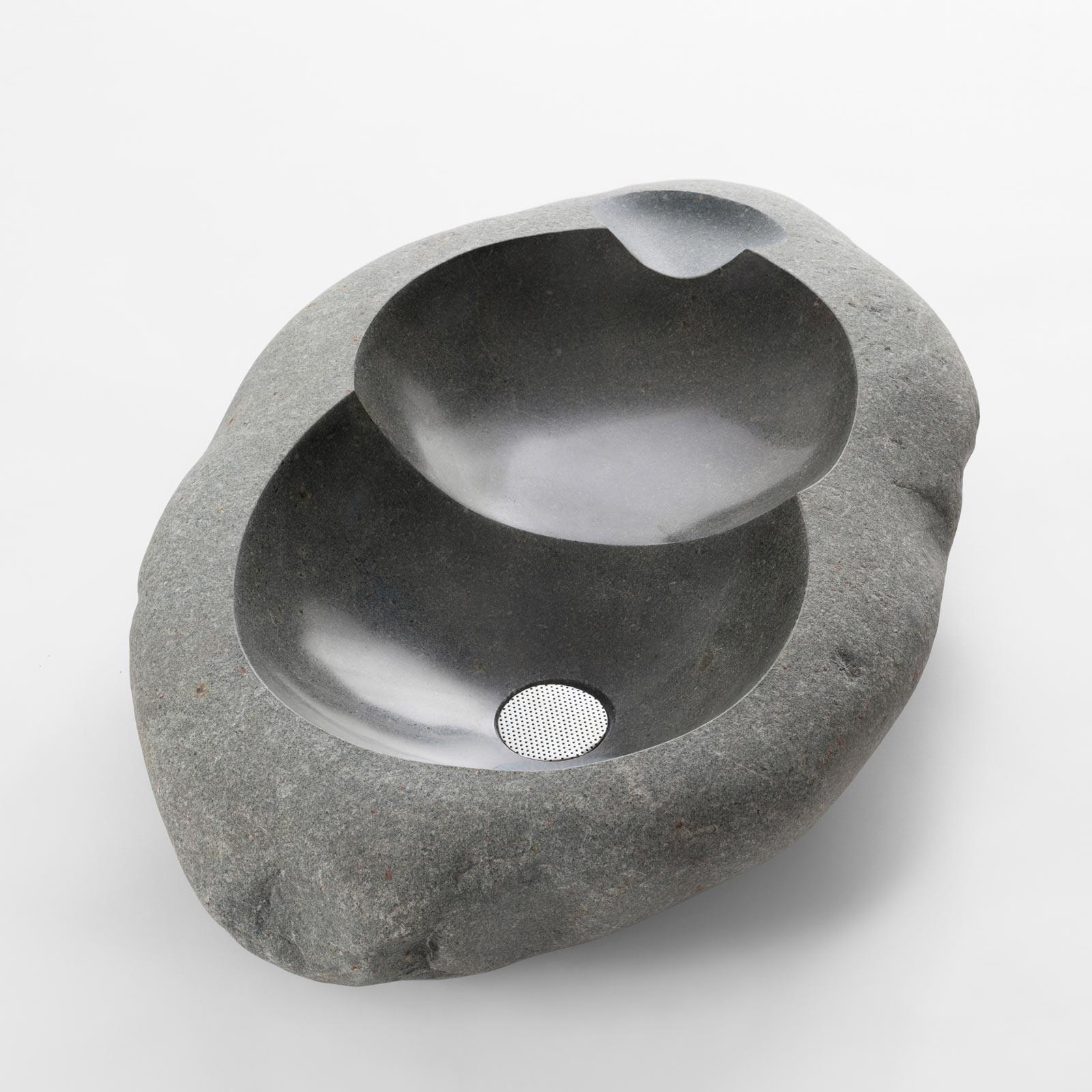 Rimac Stones N°1 by Estudio Rafael Freyre
Dimensions: W 70 D 47 x H 17 cm 
Materials: River Stones

Rimac Stones explores our hydrographic landscape and its interaction with the materiality of our territory. The water we use daily connects us