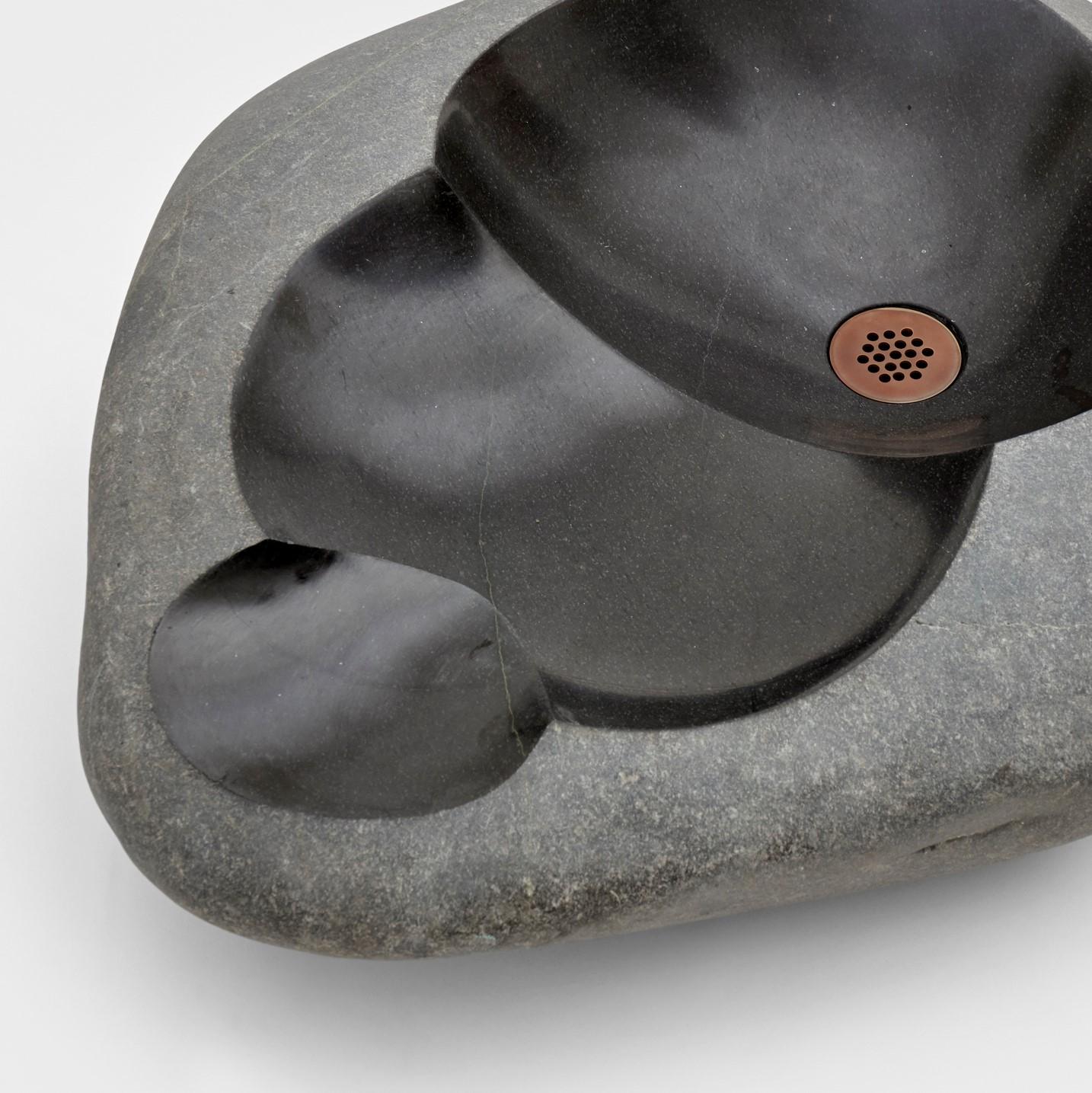 Rimac stones N°3 by Estudio Rafael Freyre.
Dimensions: W 70 D 47 x H 17 cm.
Materials: river stones.

Rimac Stones explores our hydrographic landscape and its interaction with the materiality of our territory. The water we use daily connects us
