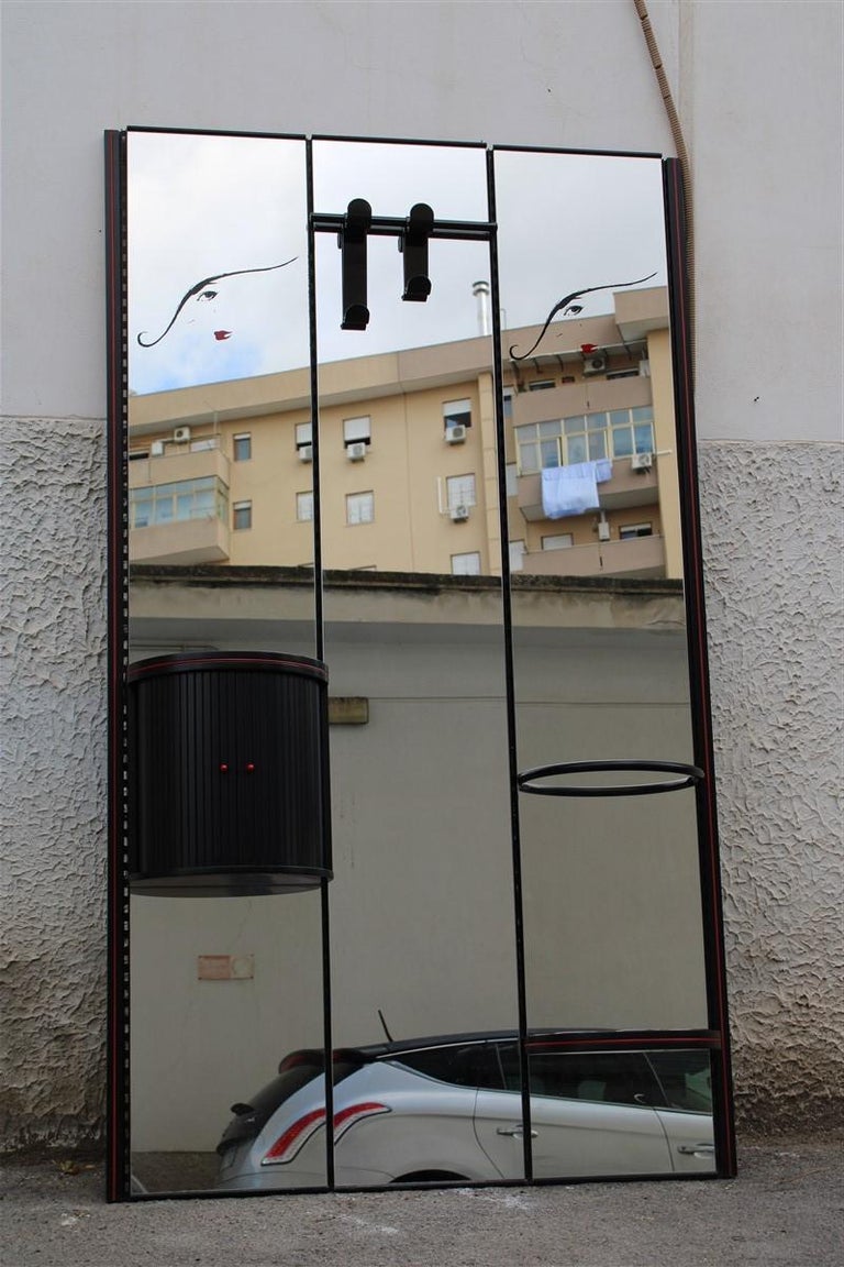 Rimadesio wall mirror black and red woman and lipstick Pop Art 1980s Italy Lucio Del Pezzo Italian Design.

Mounts a small rounded console with sliding doors, a clothes hanger and an umbrella stand that can be positioned in any side and direction.